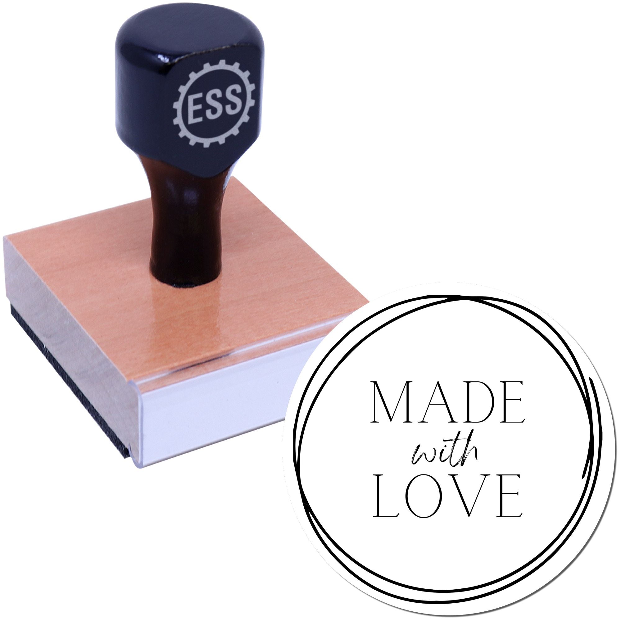 Navy ESS rubber stamp on copper-toned block with circular Made with Love seal design.
