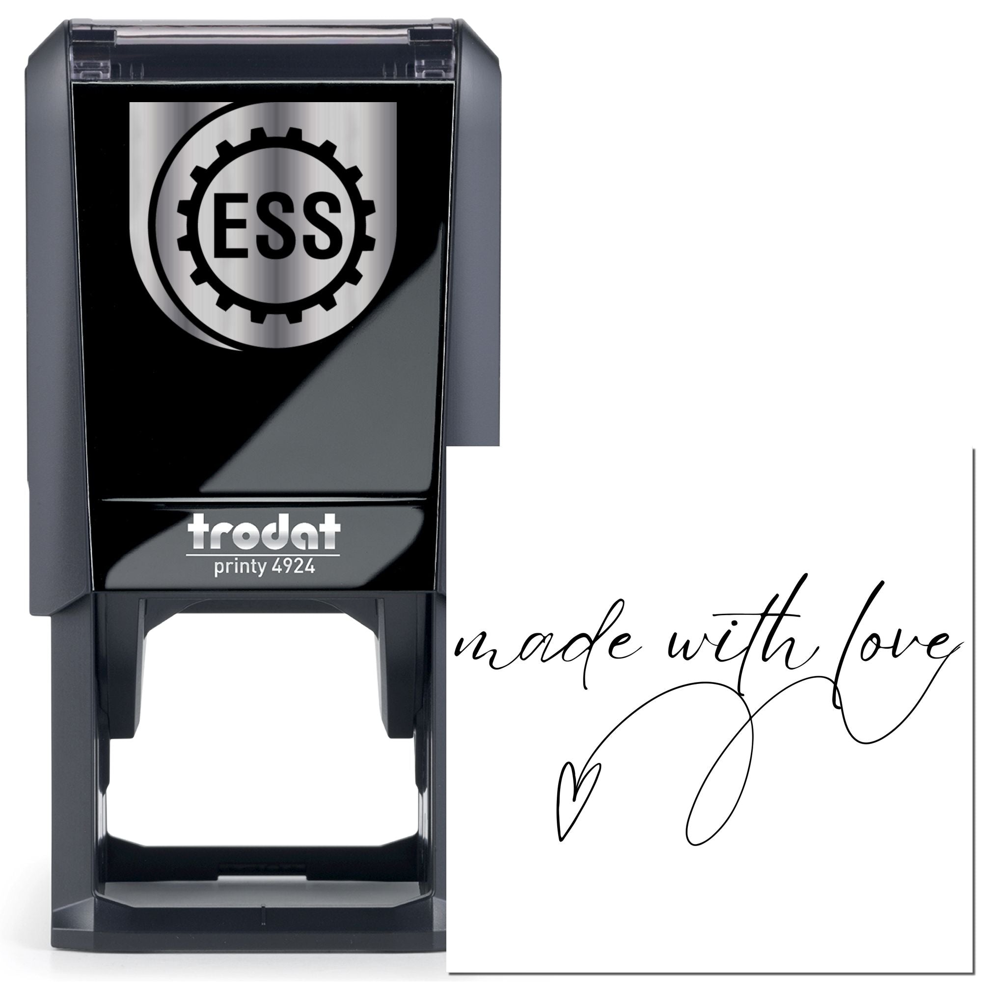 Black self-inking ESS seal stamp beside a white card with handwritten made with love and a heart.