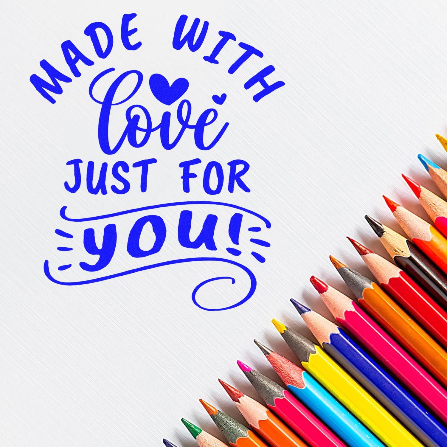 Blue custom stamp seal reading Made With Love Just for You, with colorful pencil tips on a white background.
