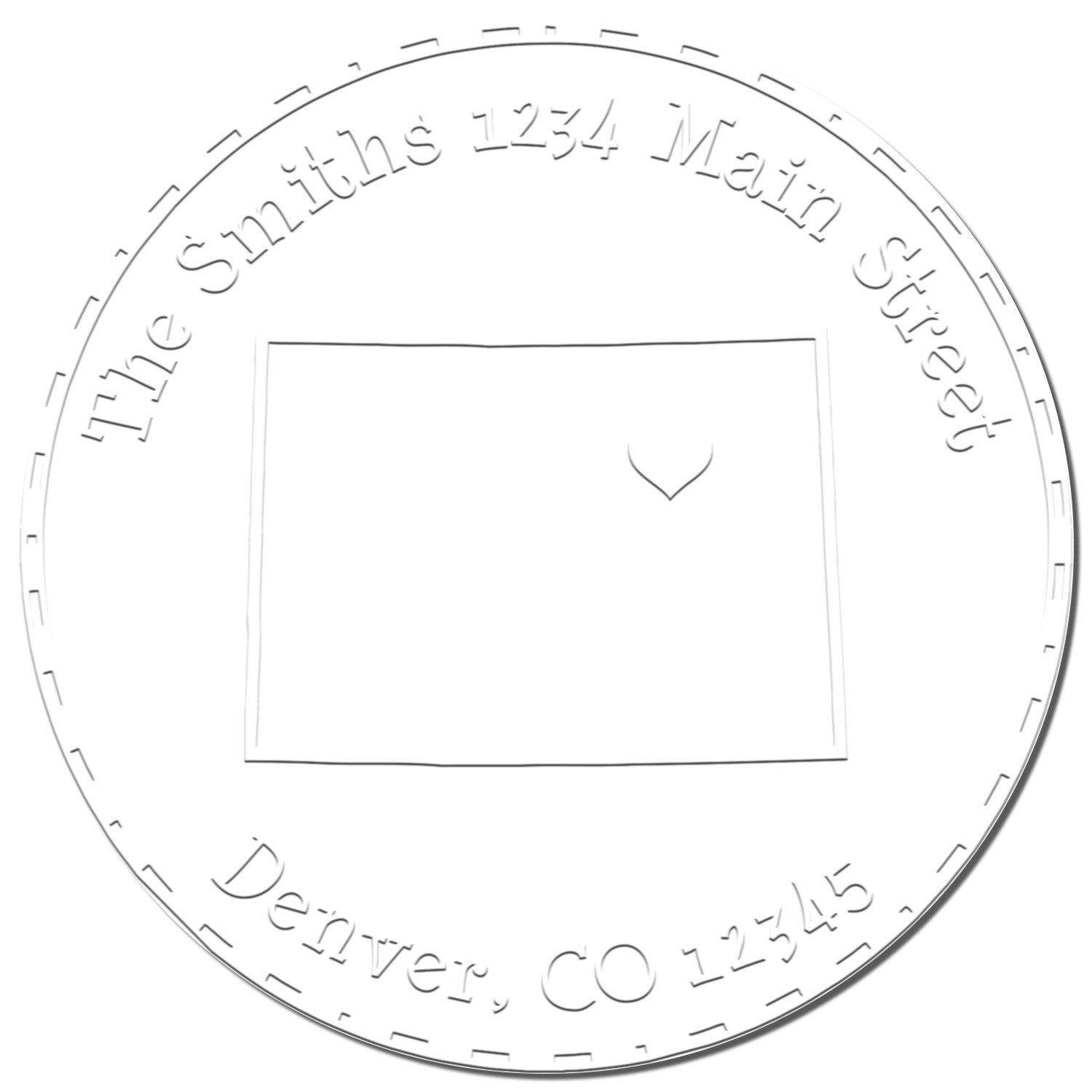 White circular embossing seal stamp with gray embossed text, Smiths, 1234 Main St, Denver, CO 12345, and blank center.