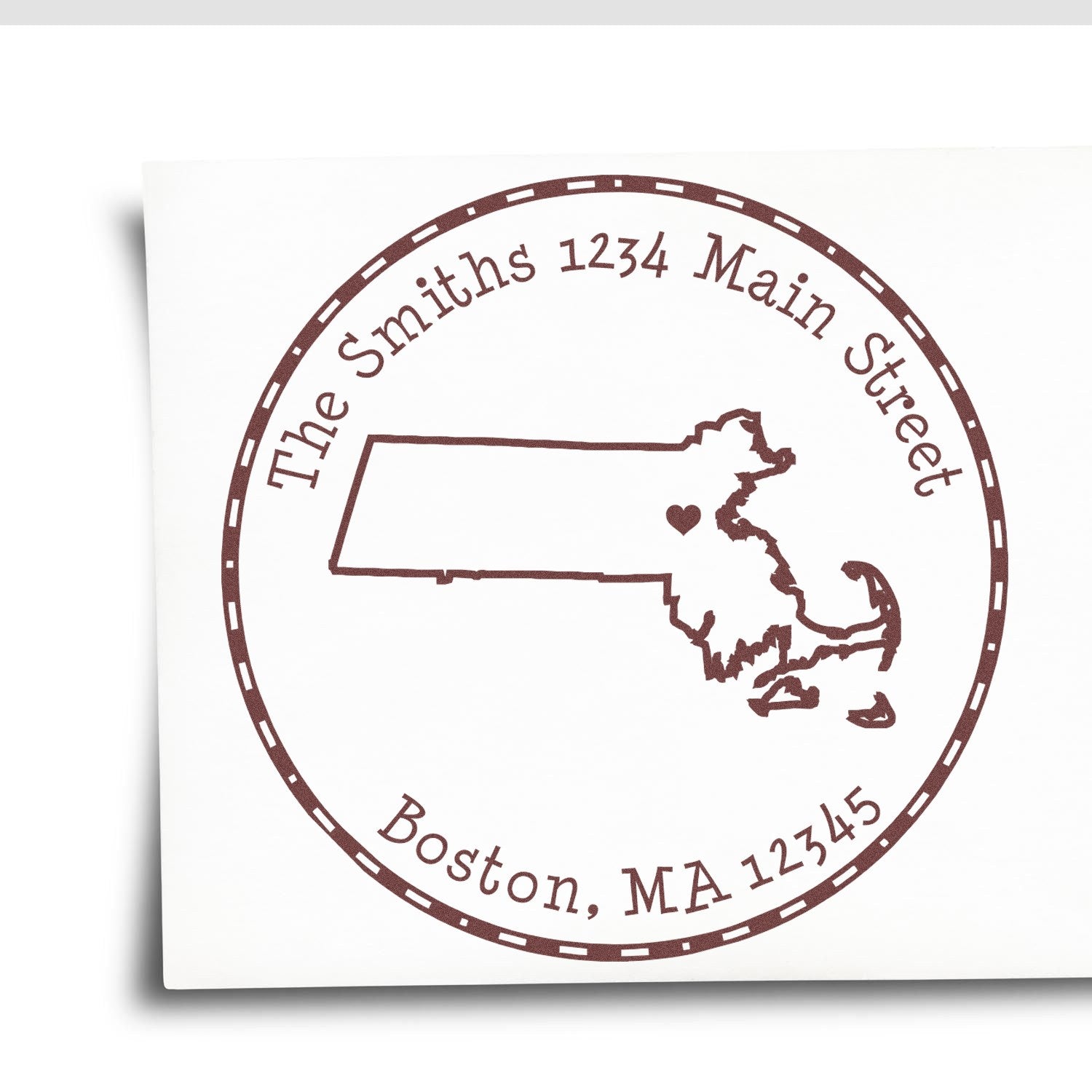 Brown circular address stamp seal with Massachusetts outline, heart marker, and The Smiths 1234 Main Street, Boston, MA 12345