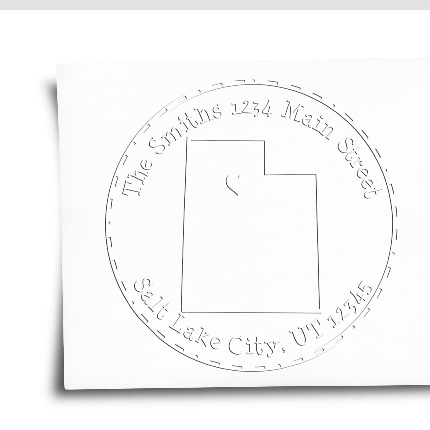 White custom stamp seal with circular border, Utah outline, and curved text for The Smiths, 1234 Main Street, Salt Lake City, UT