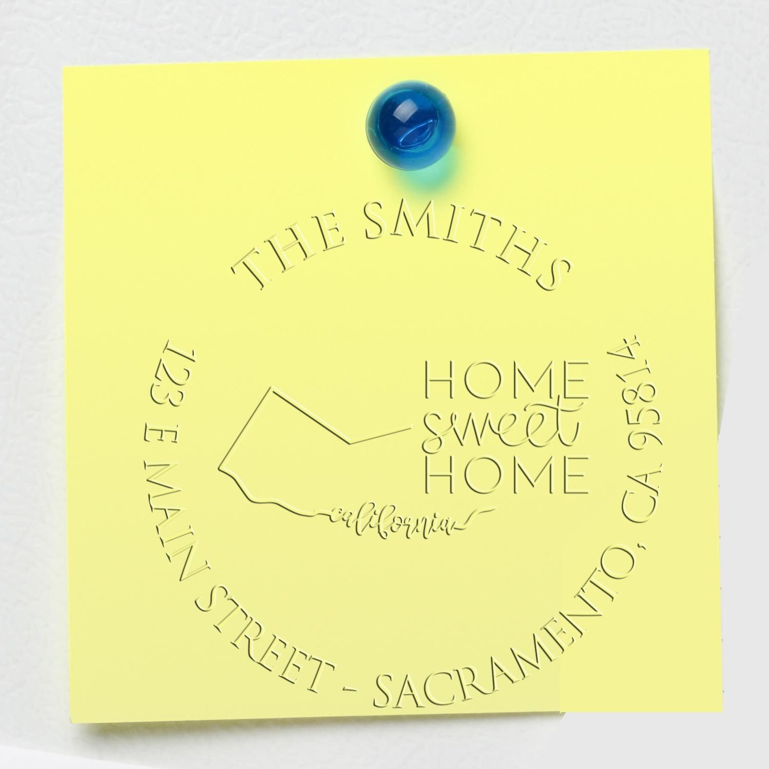 Yellow embossed custom stamp and seal with blue wax bead, featuring The Smiths, Home Sweet Home, California outline and address.