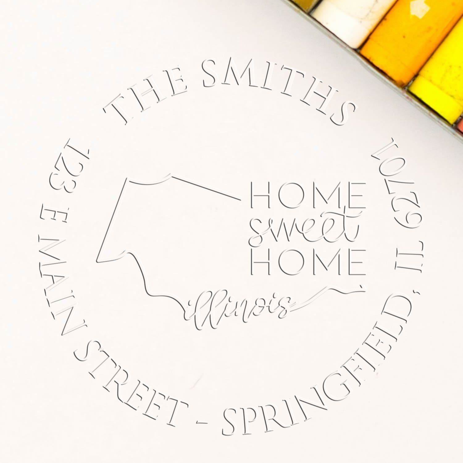 White custom stamp seal featuring The Smiths, Illinois outline, Home Sweet Home, and yellow-orange accents.
