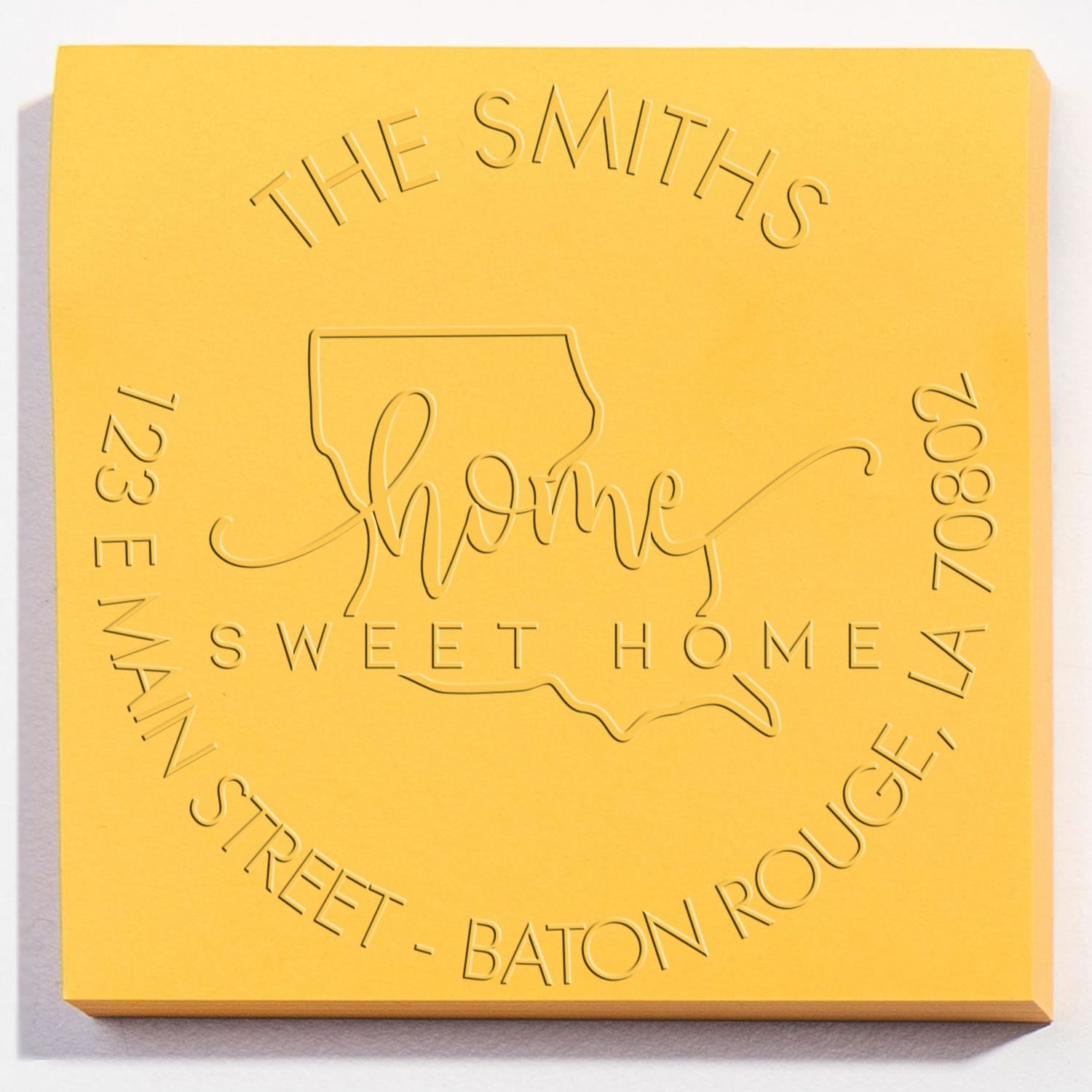 Yellow custom stamp and seal with embossed The Smiths, Louisiana outline, Sweet Home, and Baton Rouge address.