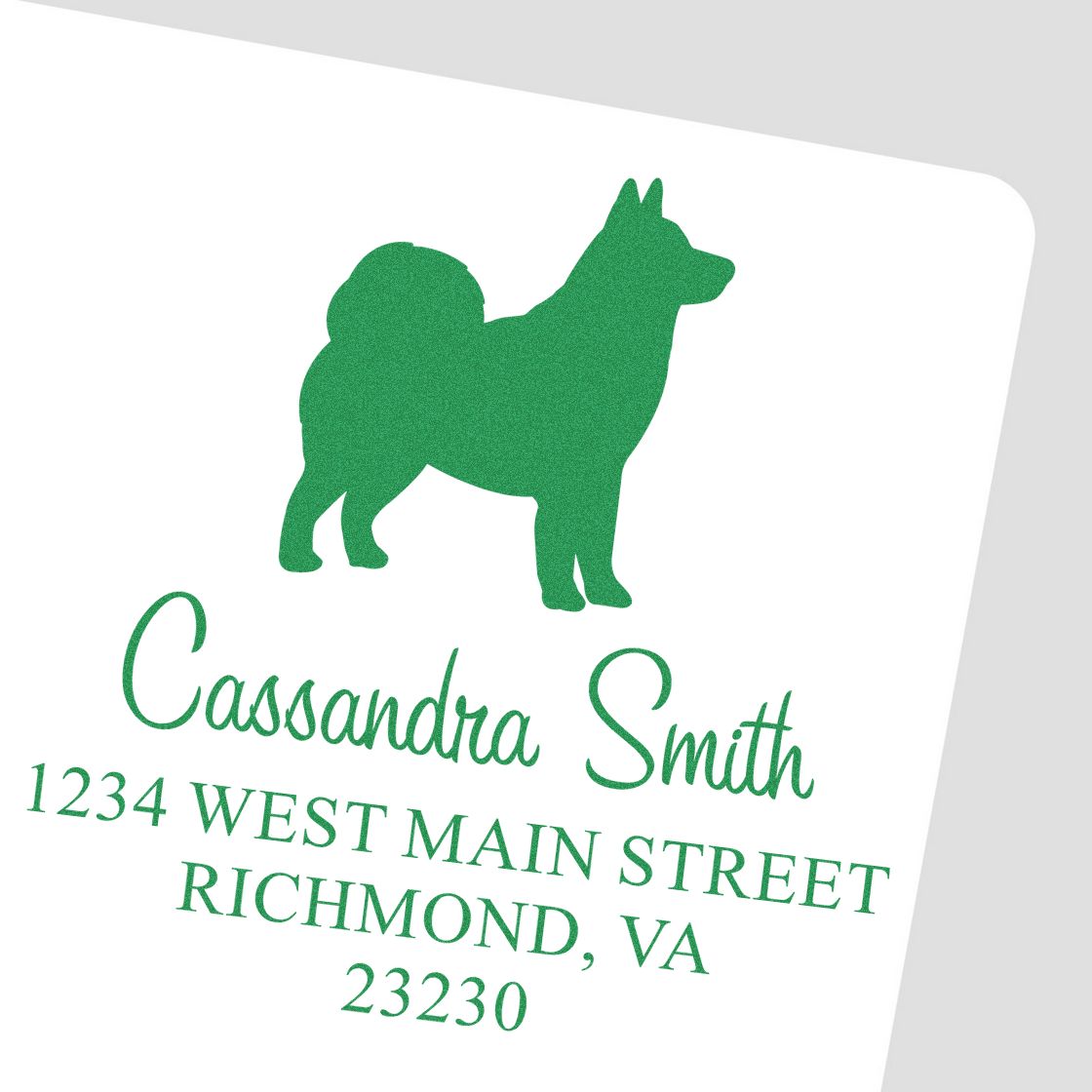Green custom stamp and seal featuring a dog silhouette, Cassandra Smith, and Richmond, VA address on white.