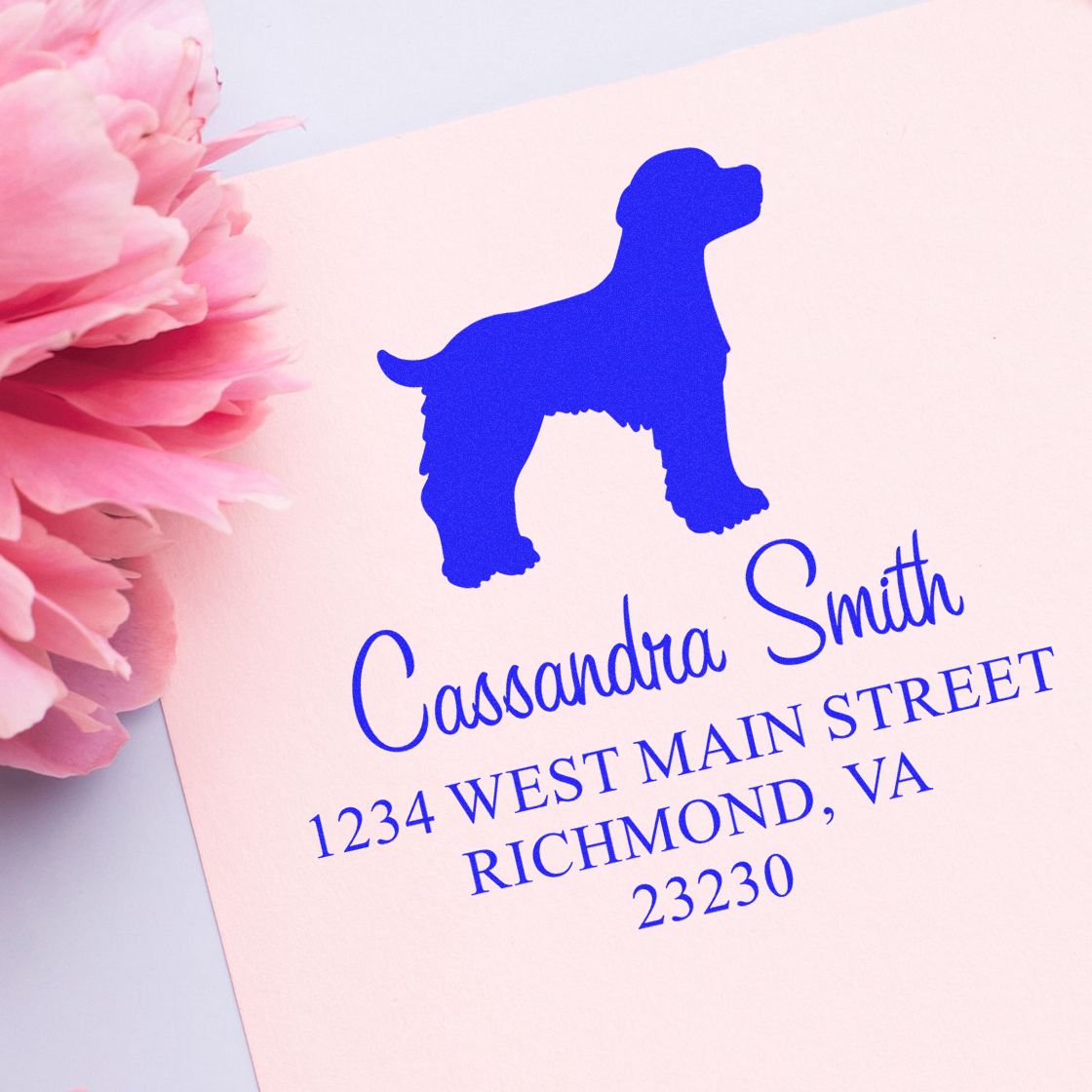 ESS Wood Handle Brittany Spaniel dog stamp in use, featuring a detailed rubber stamp with a Brittany Spaniel design.