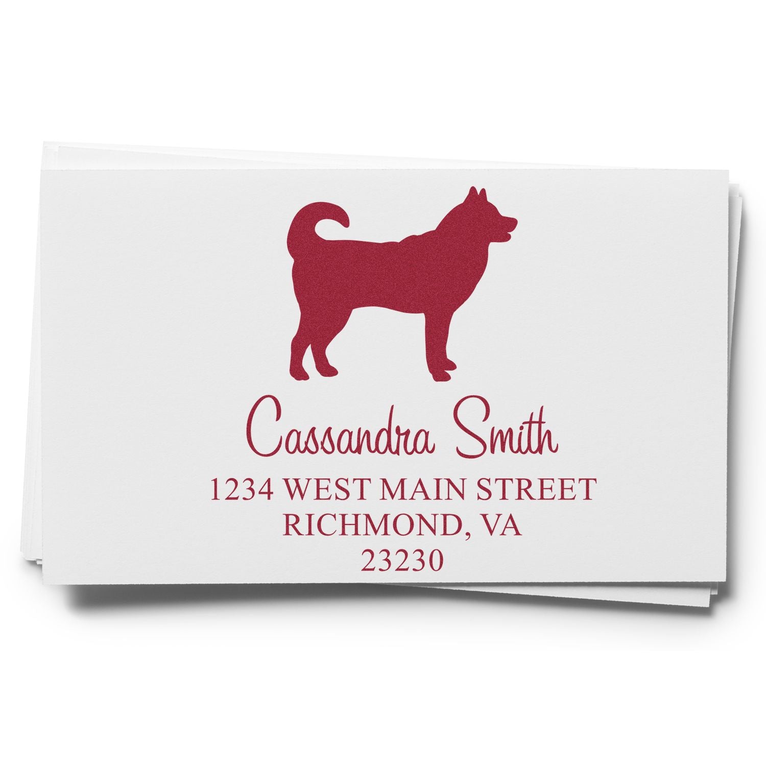 Burgundy custom address stamp and seal with dog silhouette, Cassandra Smith, and Richmond, VA on white cards.