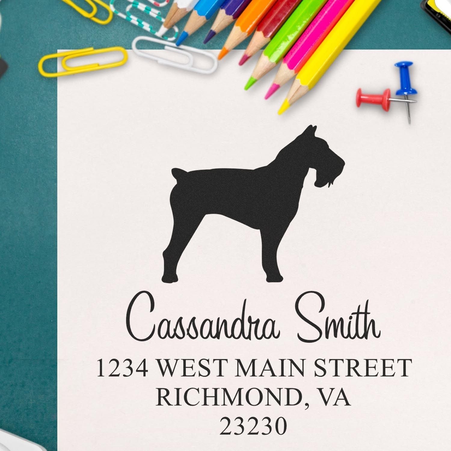 ESS Wood Handle Schnauzer Dog Stamp in use, featuring a detailed Schnauzer illustration on a rubber address label stamp.