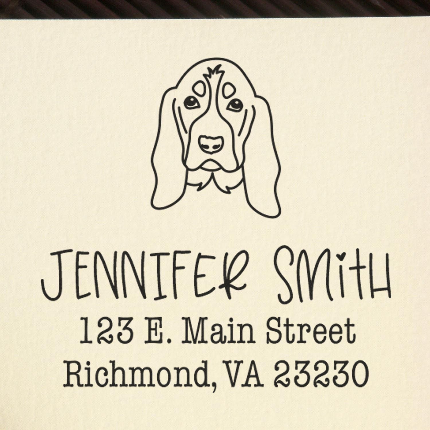 Black custom stamp seal with dog illustration, Jennifer Smith, and Richmond, VA address on cream paper.