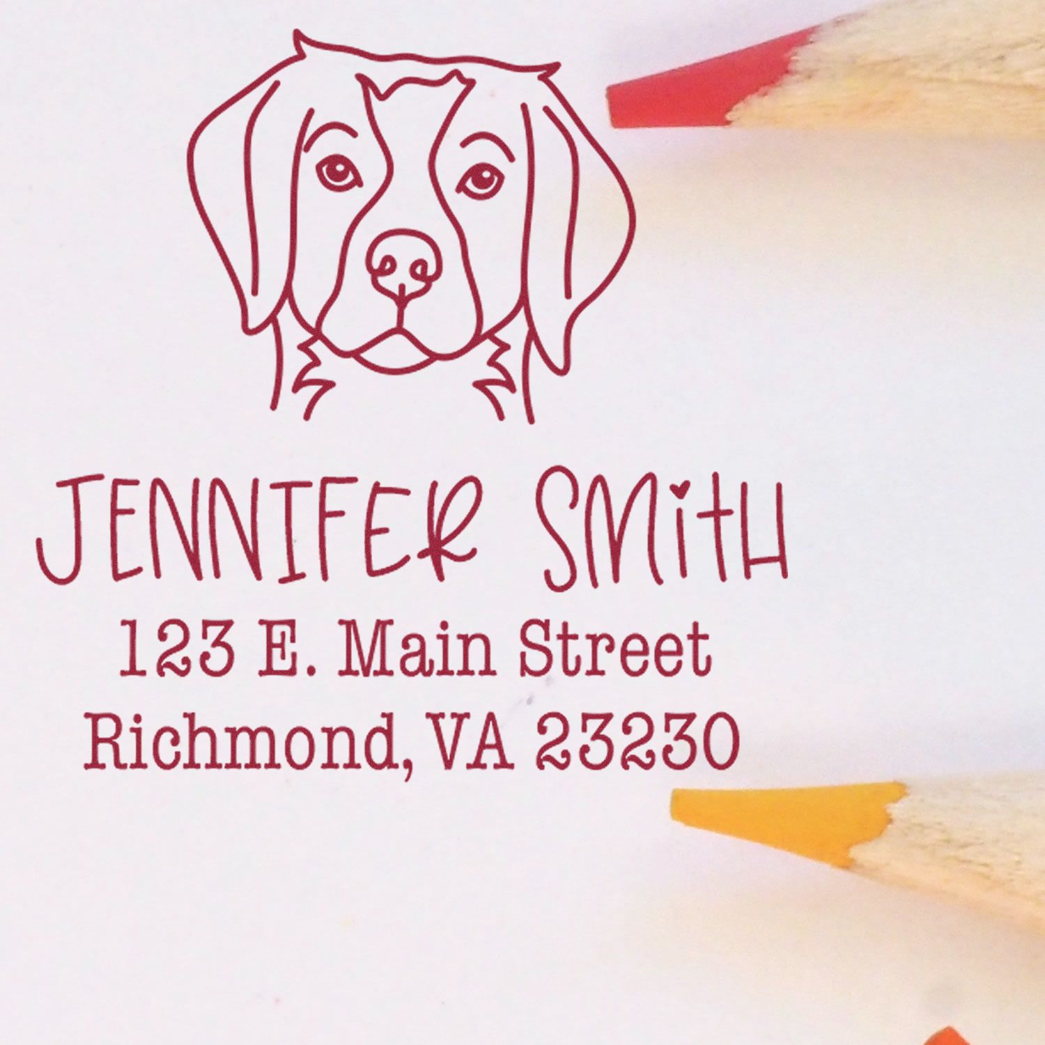 Wood handle Brittany Spaniel dog stamp by ESS in use, showing detailed rubber stamp with Brittany Spaniel design.