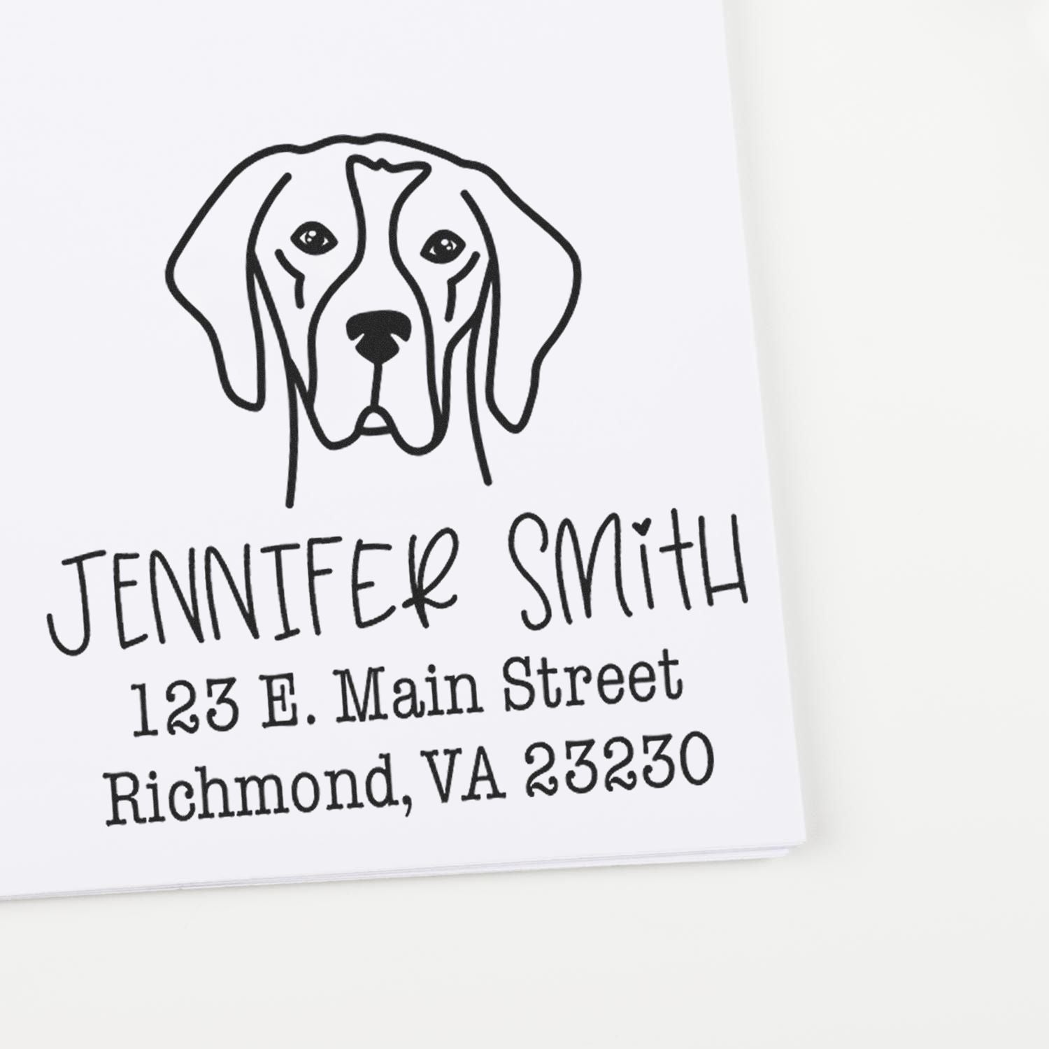 Custom black address stamp with dog logo, Jennifer Smith, 123 E. Main Street, Richmond, VA 23230.