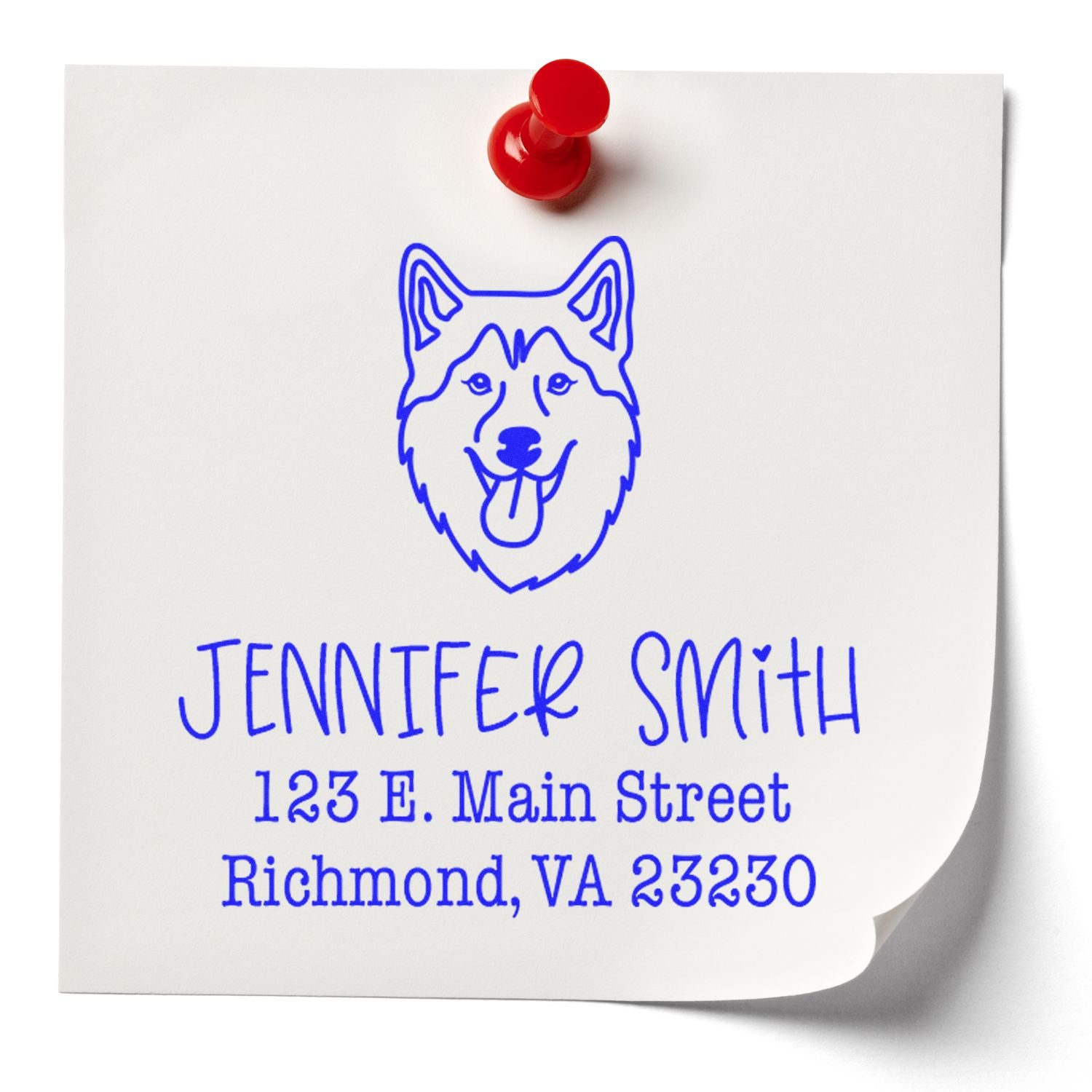 Blue personalized address stamp seal with husky dog logo on white paper, pinned with a red push pin.