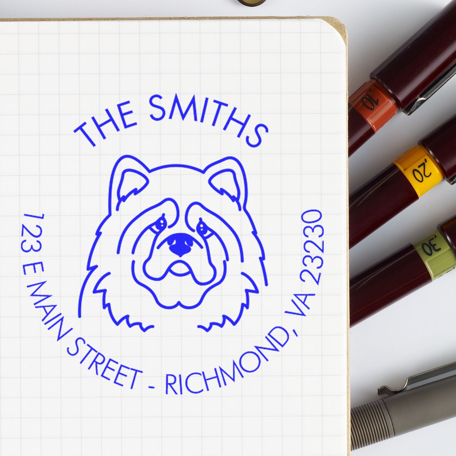 Blue bulldog return address stamp reading The Smiths, 123 E Main Street, Richmond VA 23230, with colored seal handles.
