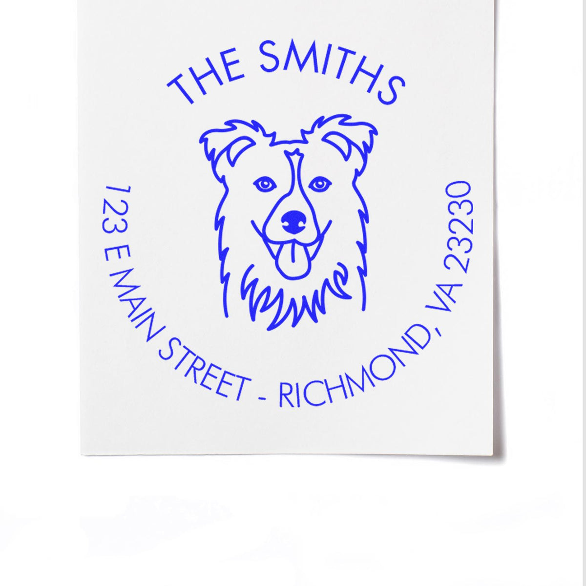 Blue custom address stamp and seal with dog logo for The Smiths, 123 E Main Street, Richmond, VA 23230.