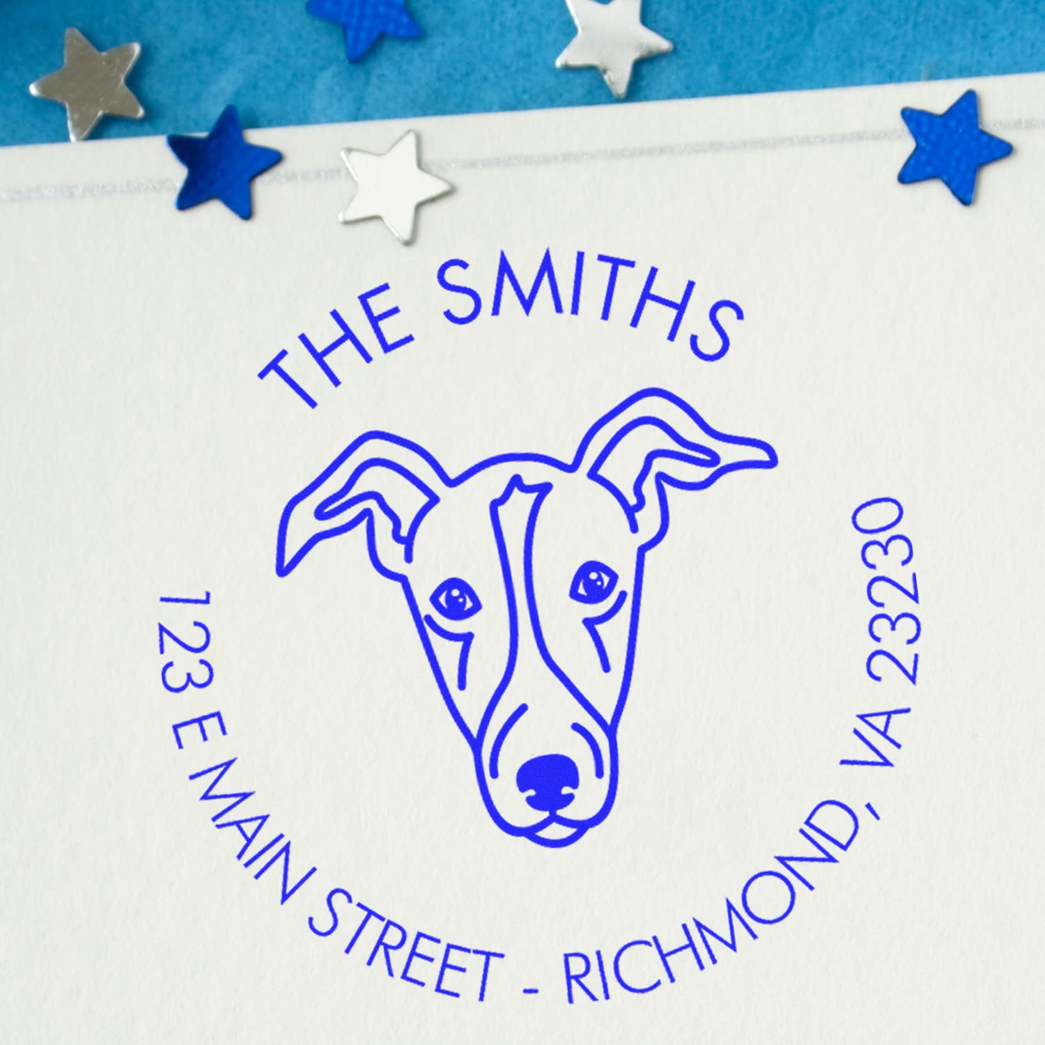 Blue custom dog address stamp seal with stars, reading The Smiths, 123 E Main Street, Richmond, VA 23230.