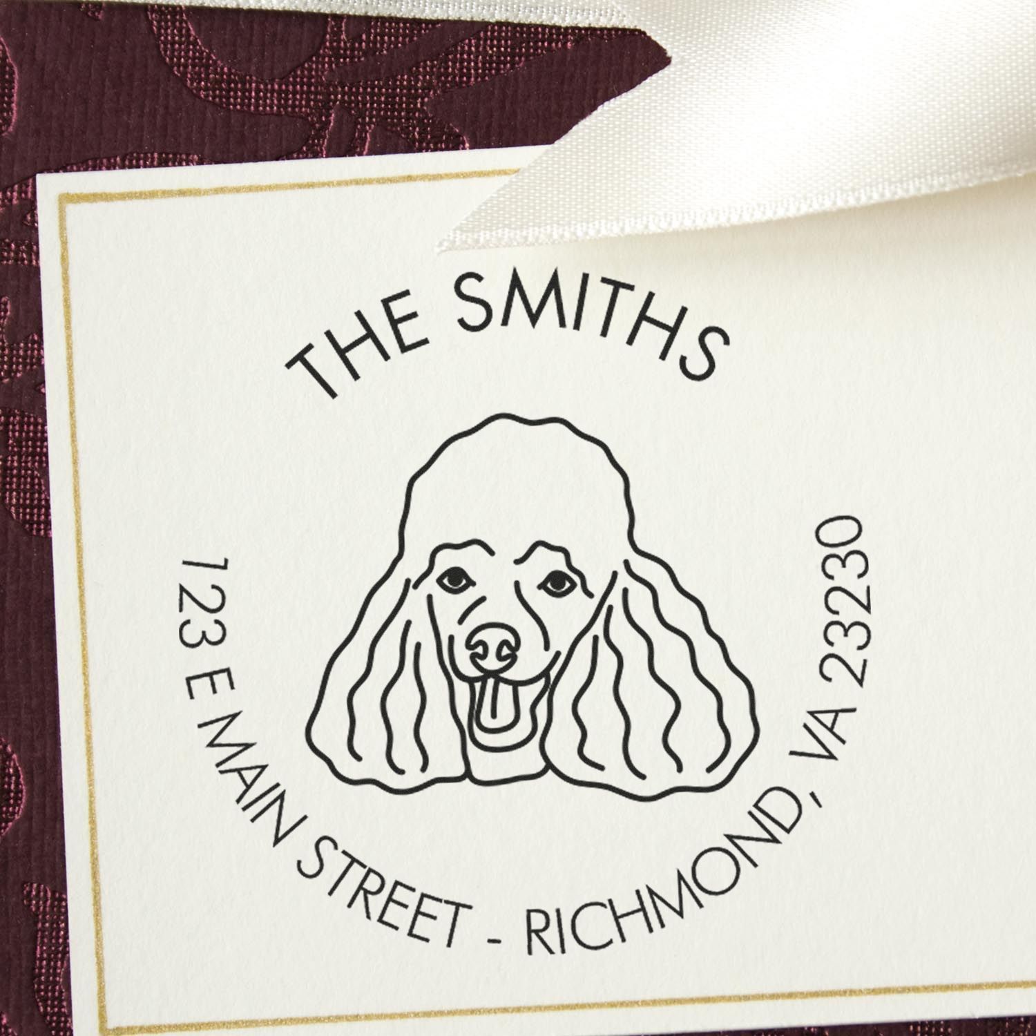 White custom stamp and seal label with black poodle logo, gold border, and burgundy background; The Smiths, 123 E Main Street, Richmond, VA 23230