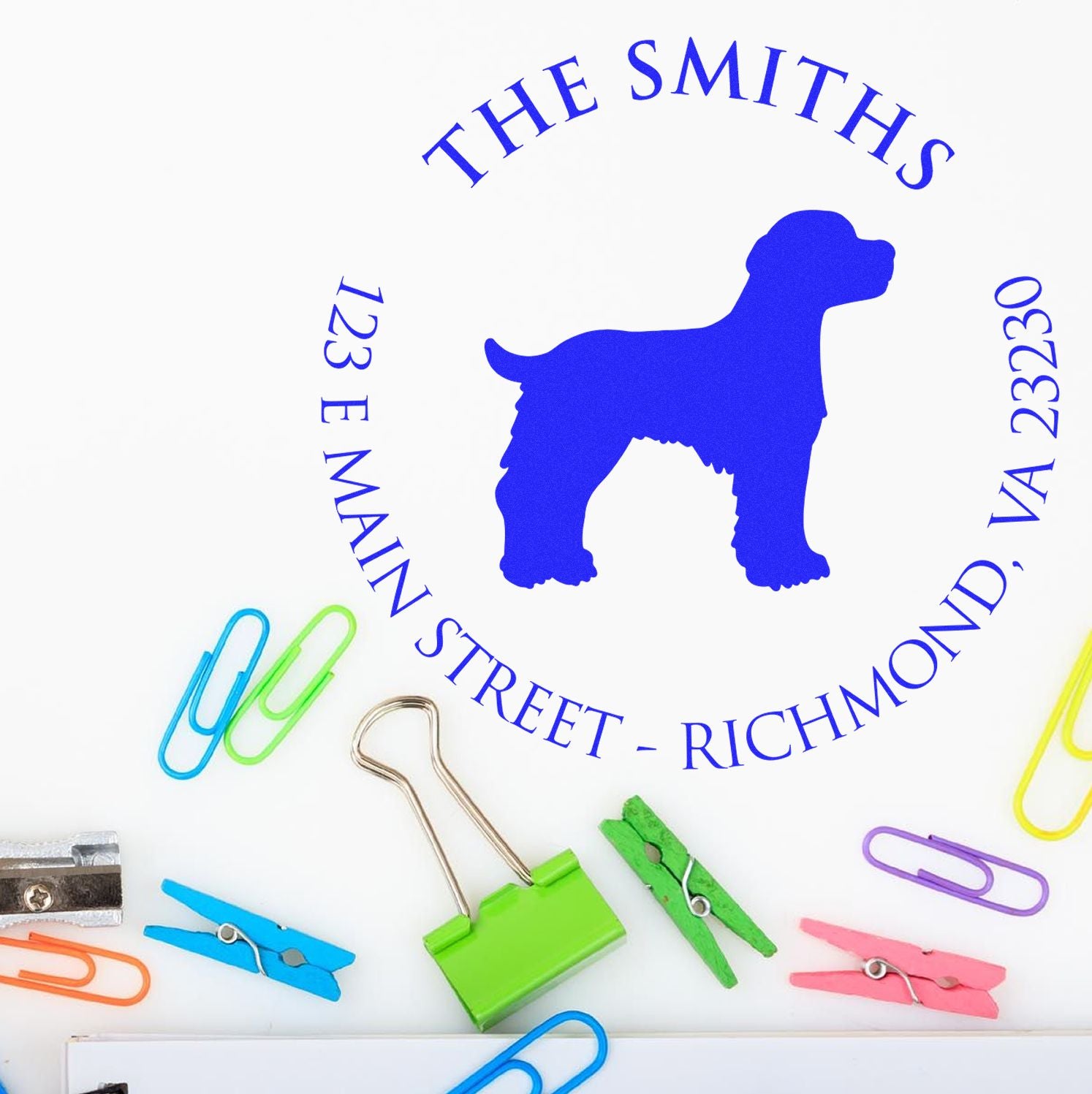 Blue custom dog address stamp seal for The Smiths, 123 E Main Street, Richmond VA 23230, with colorful office clips