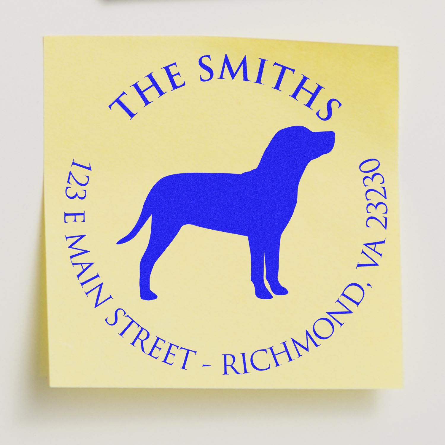 Yellow custom stamp seal with blue dog silhouette and circular text for The Smiths, 123 E Main Street, Richmond, VA 23230