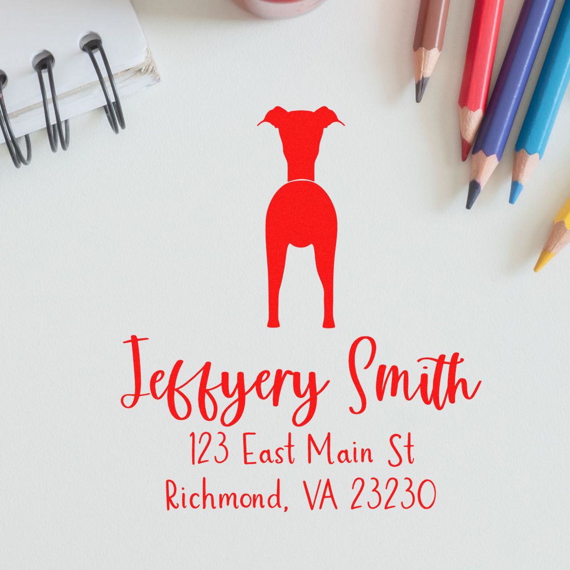 Red custom return address stamp and seal with dog silhouette, Jeffrey Smith, 123 East Main St, Richmond VA.
