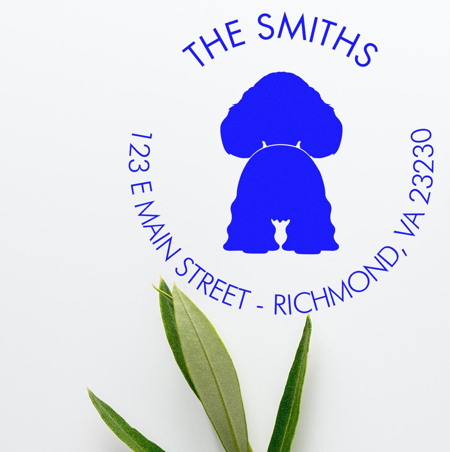 Blue custom stamp and seal for The Smiths with circular text, person icon, and address 723 E Main Street, Richmond, VA 23230.