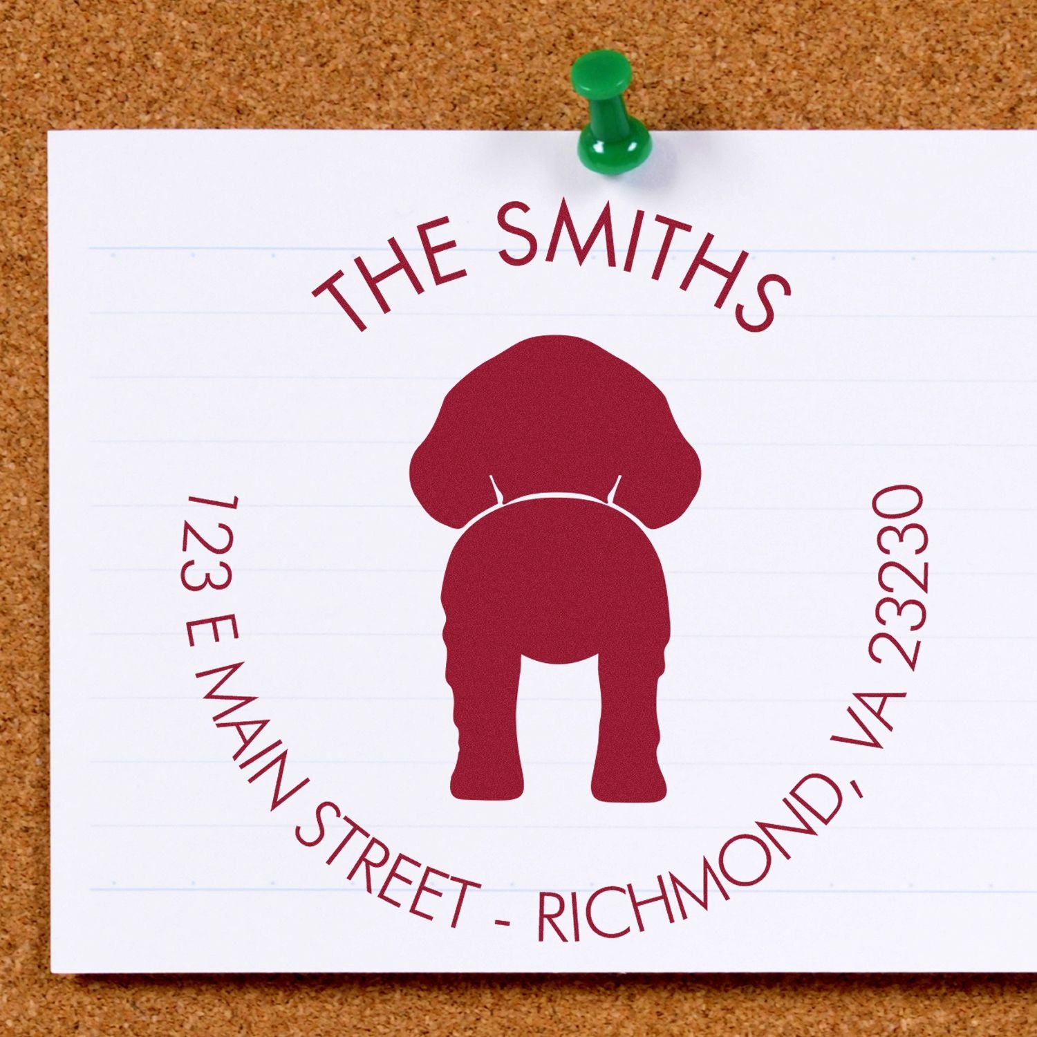 ESS Wood Handle Brittany dog address rubber stamp in use, showing detailed custom address design on white paper.