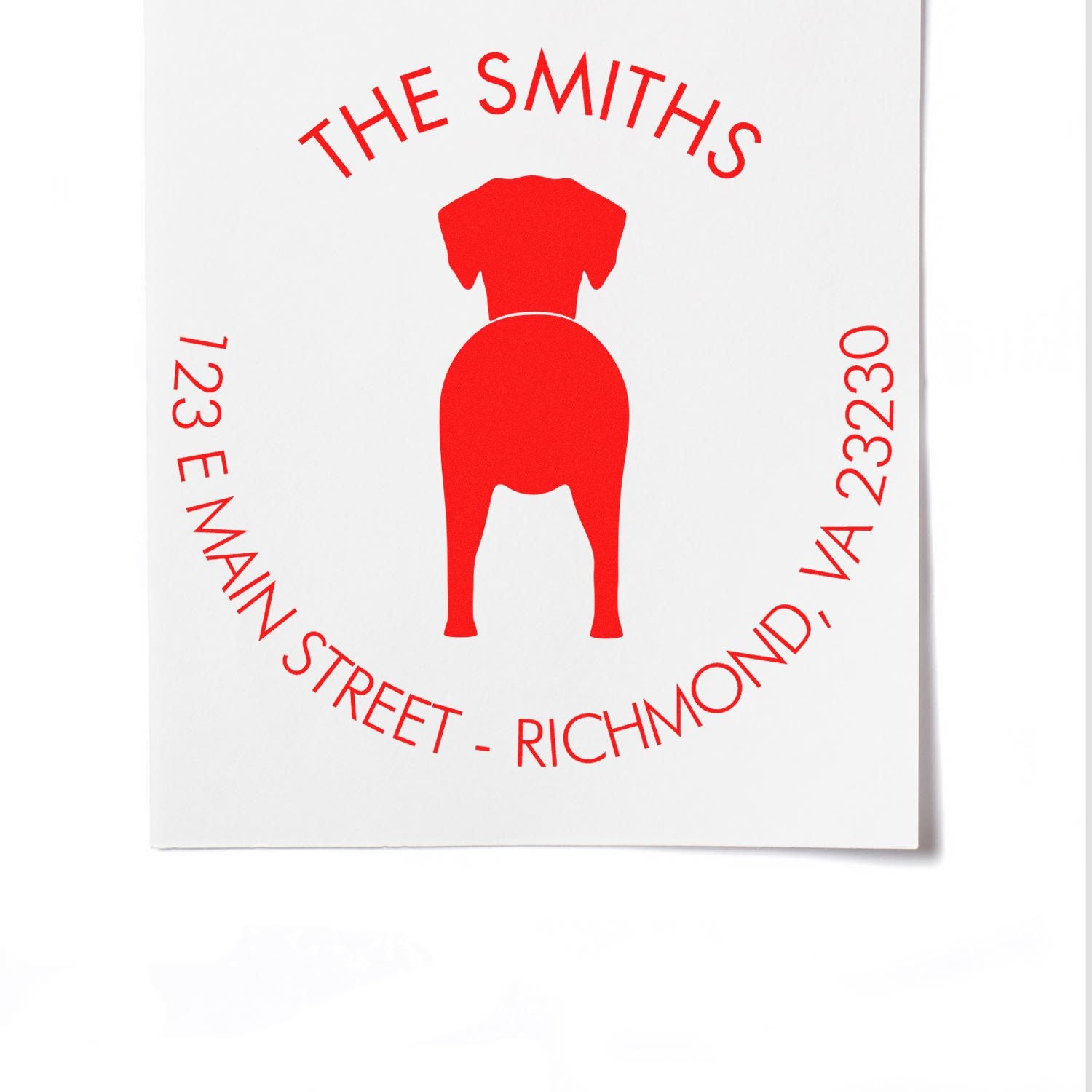 Dog stamp with a wood handle featuring a Dalmatian design, used for custom pet address rubber stamping by ESS.