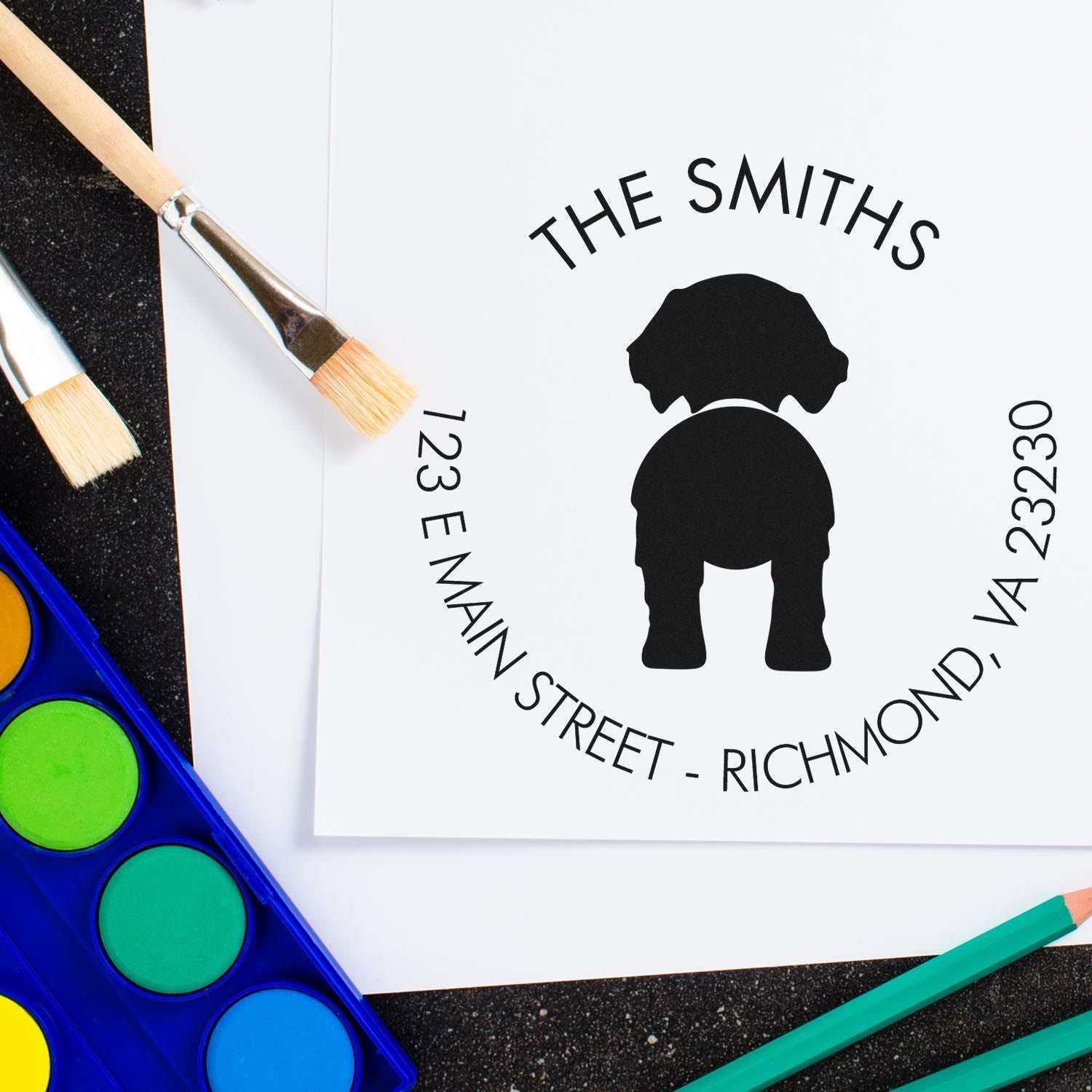 Goldendoodle dog stamp with a wooden handle, used for custom return address rubber stamping, by ESS.