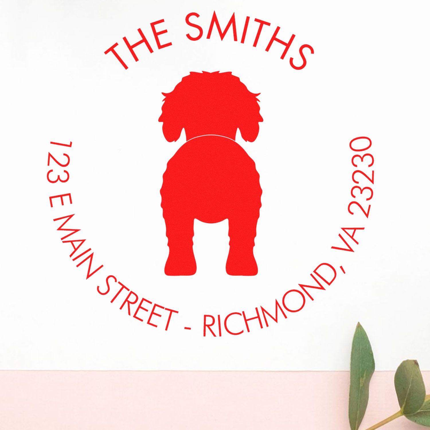 Goldendoodle dog stamp with a wood handle from ESS, used as a custom return address rubber stamp.