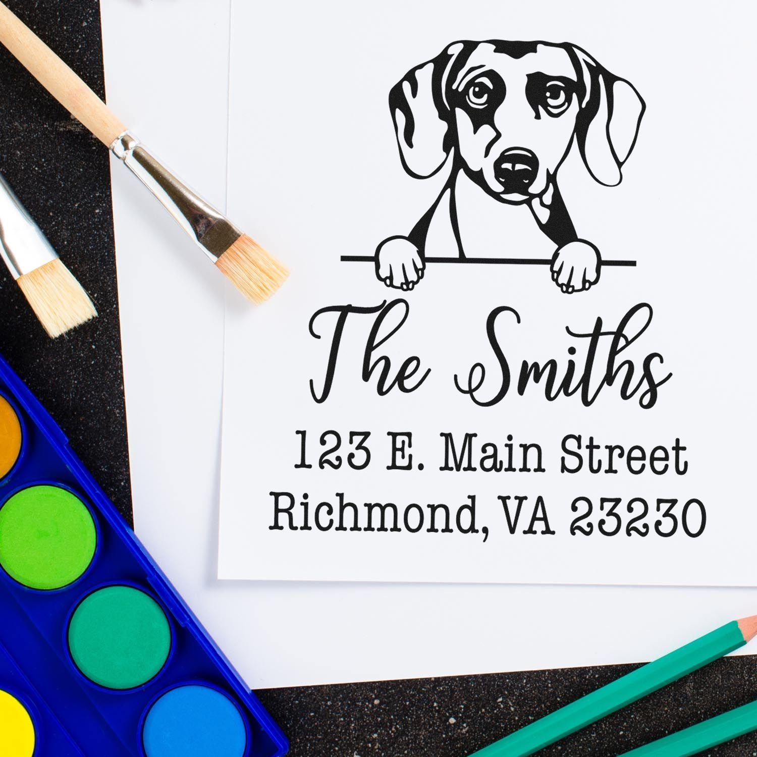 Custom black-and-white dog family address stamp and seal with The Smiths name, Richmond VA address, and art brushes
