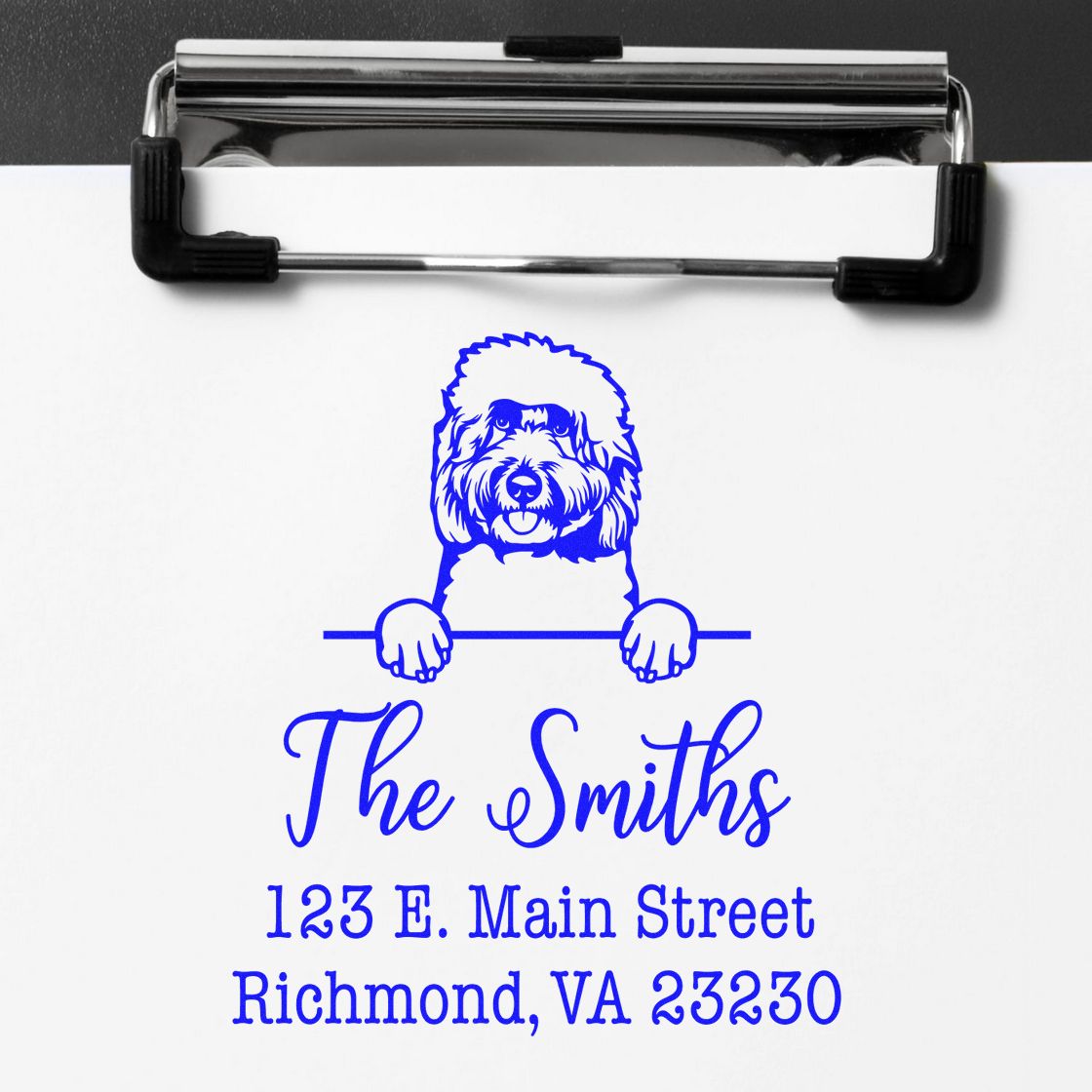 Blue custom stamp and seal with dog logo, The Smiths and Richmond, VA address on white paper.
