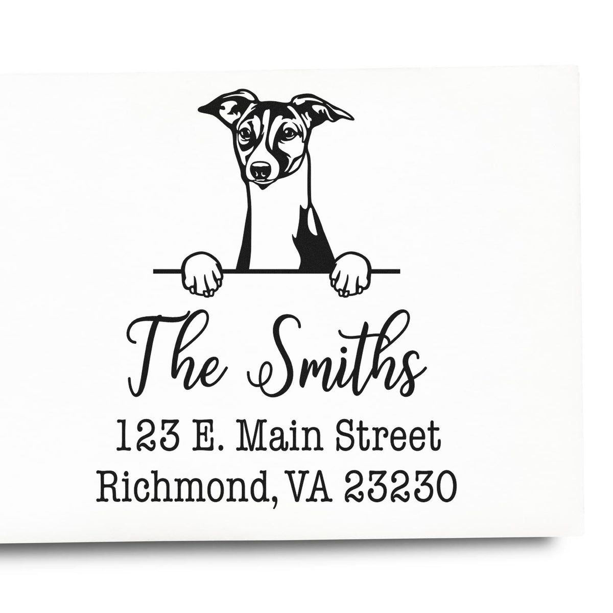 Self-inking Italian Greyhound dog stamp by Trodat in use, featuring a detailed handcrafted design on a white envelope.