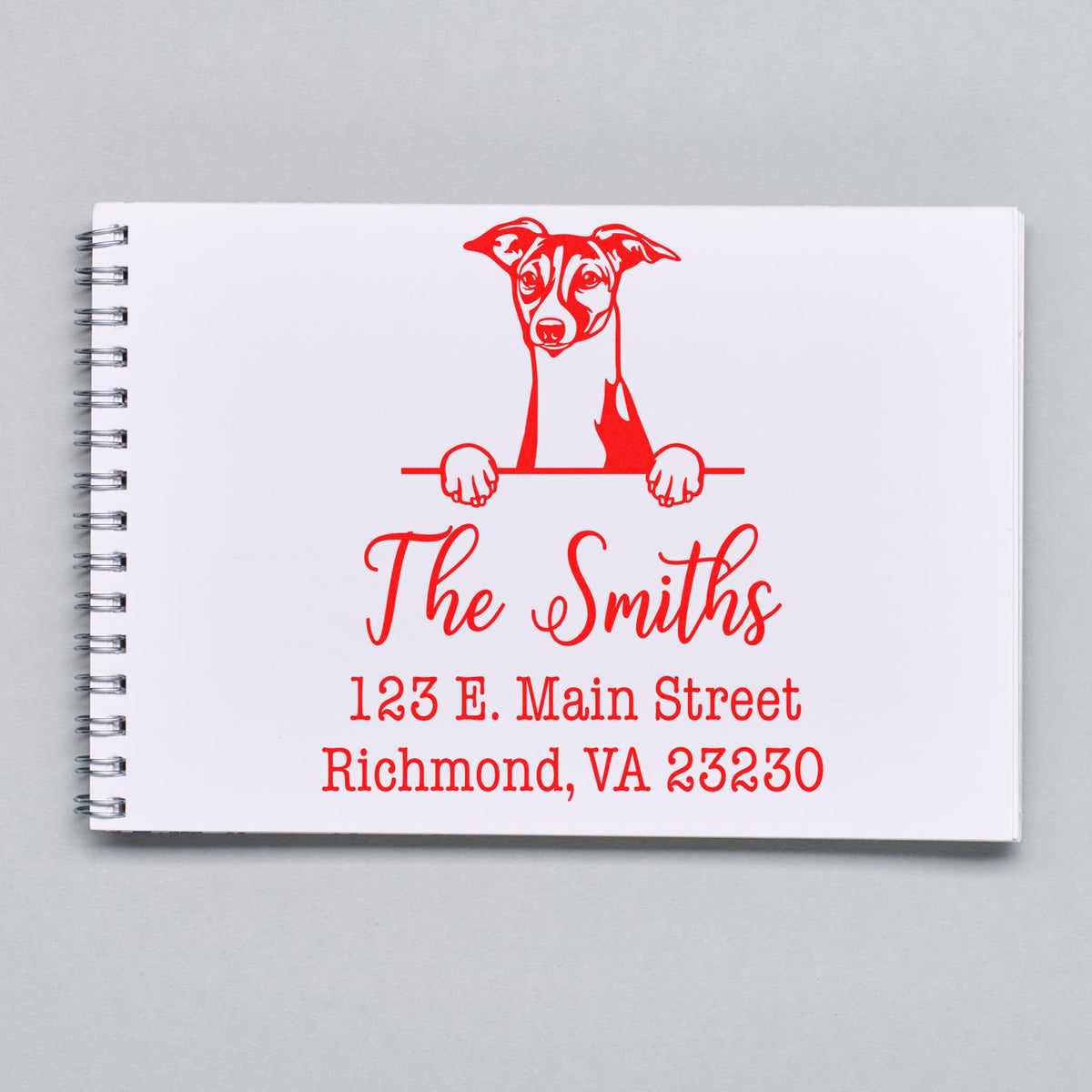Self-inking Italian Greyhound stamp by Trodat, featuring a detailed handcrafted dog design on a white ink pad.