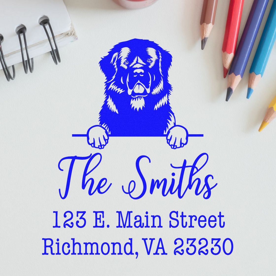 Blue custom stamp and seal with dog logo, The Smiths, and Richmond, VA on white paper.