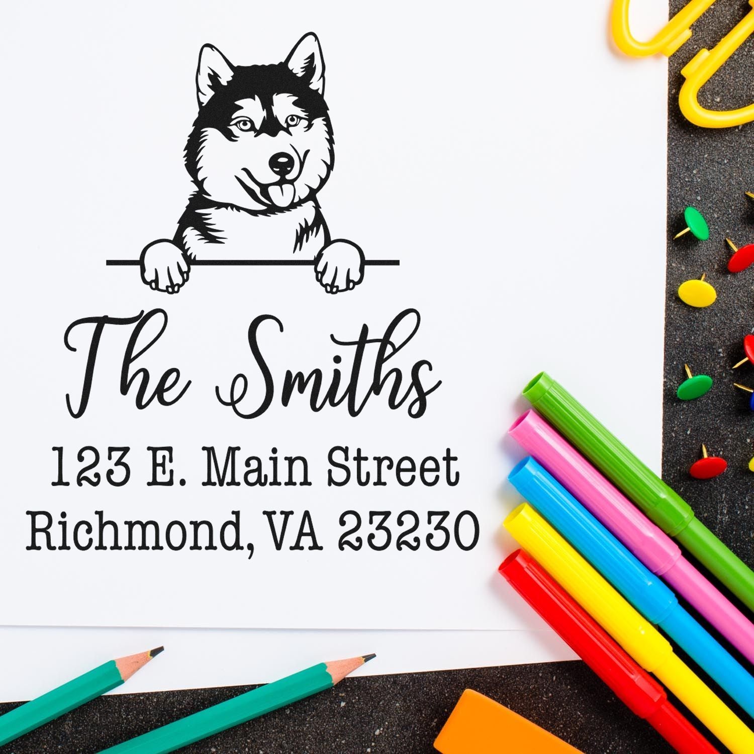 Custom black-and-white husky return address stamp and seal for The Smiths, Richmond VA, with colorful pens.