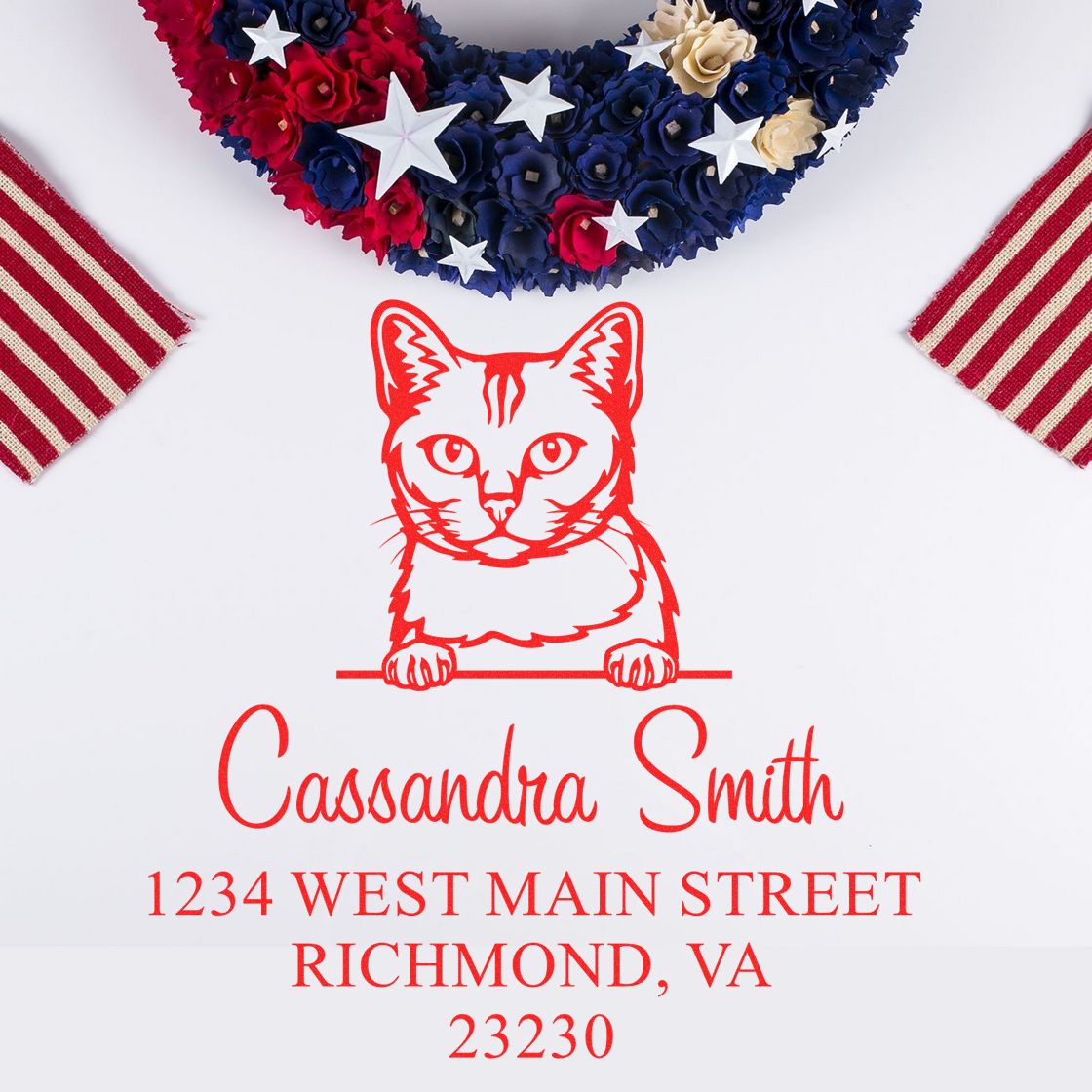 Custom red cat return address stamp/seal with Cassandria Smith, Richmond VA, and red, white, and blue stars and florals.