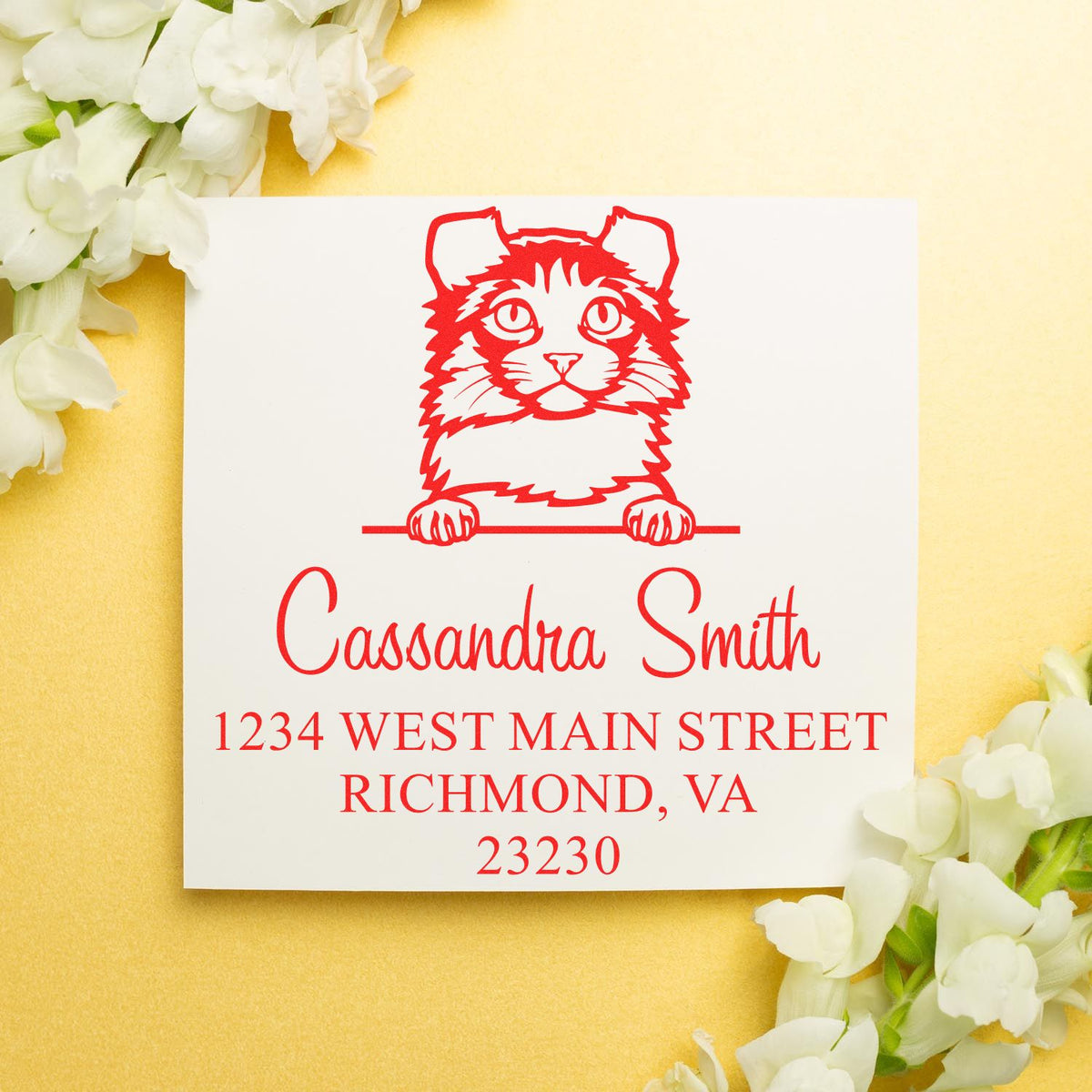 Red cat custom address stamp and seal with Cassandra Smith, Richmond, VA address on a white card with white flowers.
