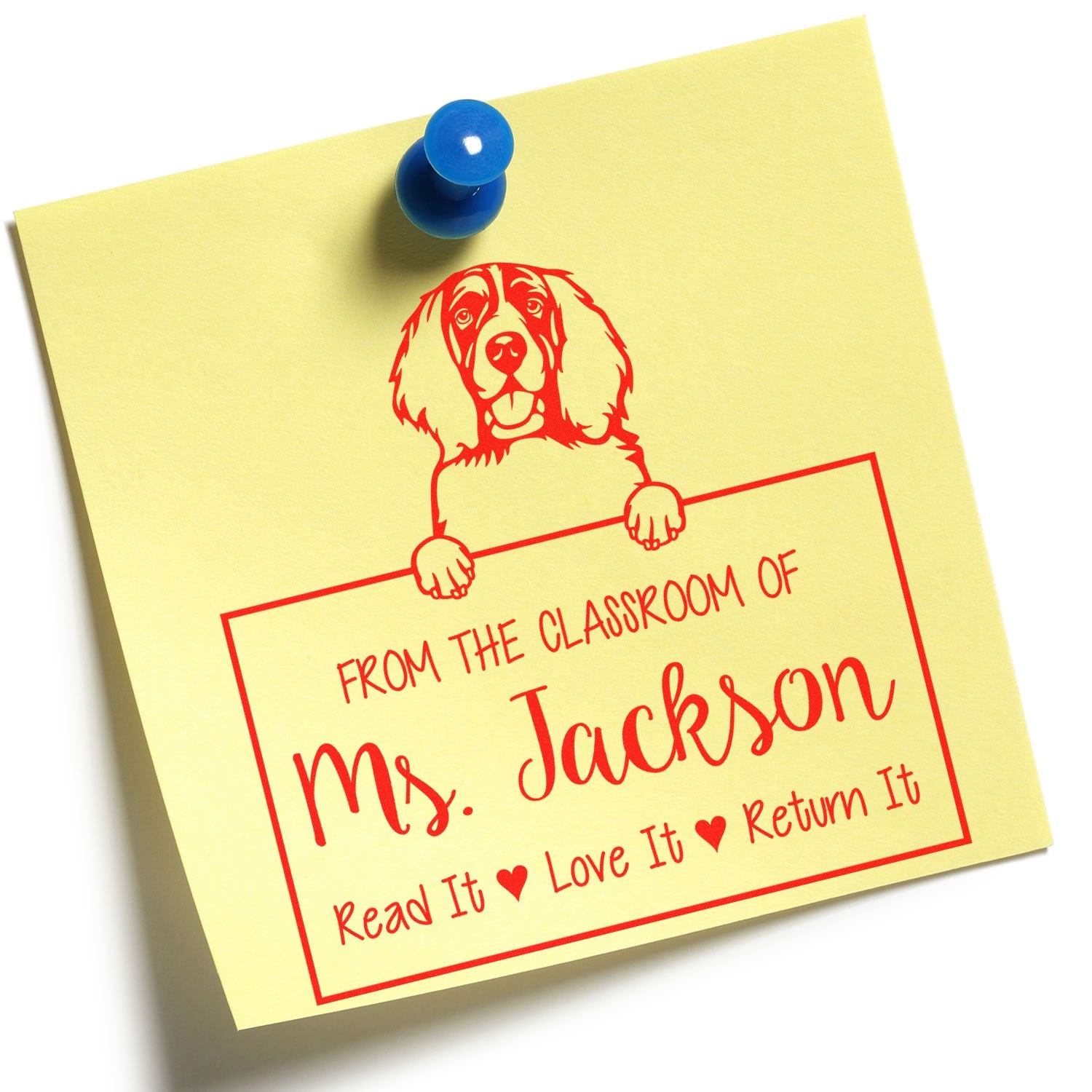 Yellow sticky note with blue pushpin and red classroom return stamp reading Mrs. Jackson with dog illustration.