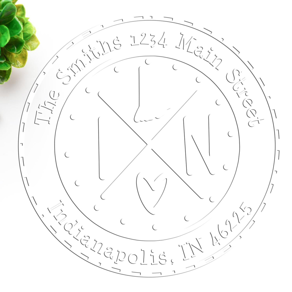 Circular white custom address stamp and seal with gray outline text for The Smiths, 1234 Main Street, Indianapolis, IN 46225.