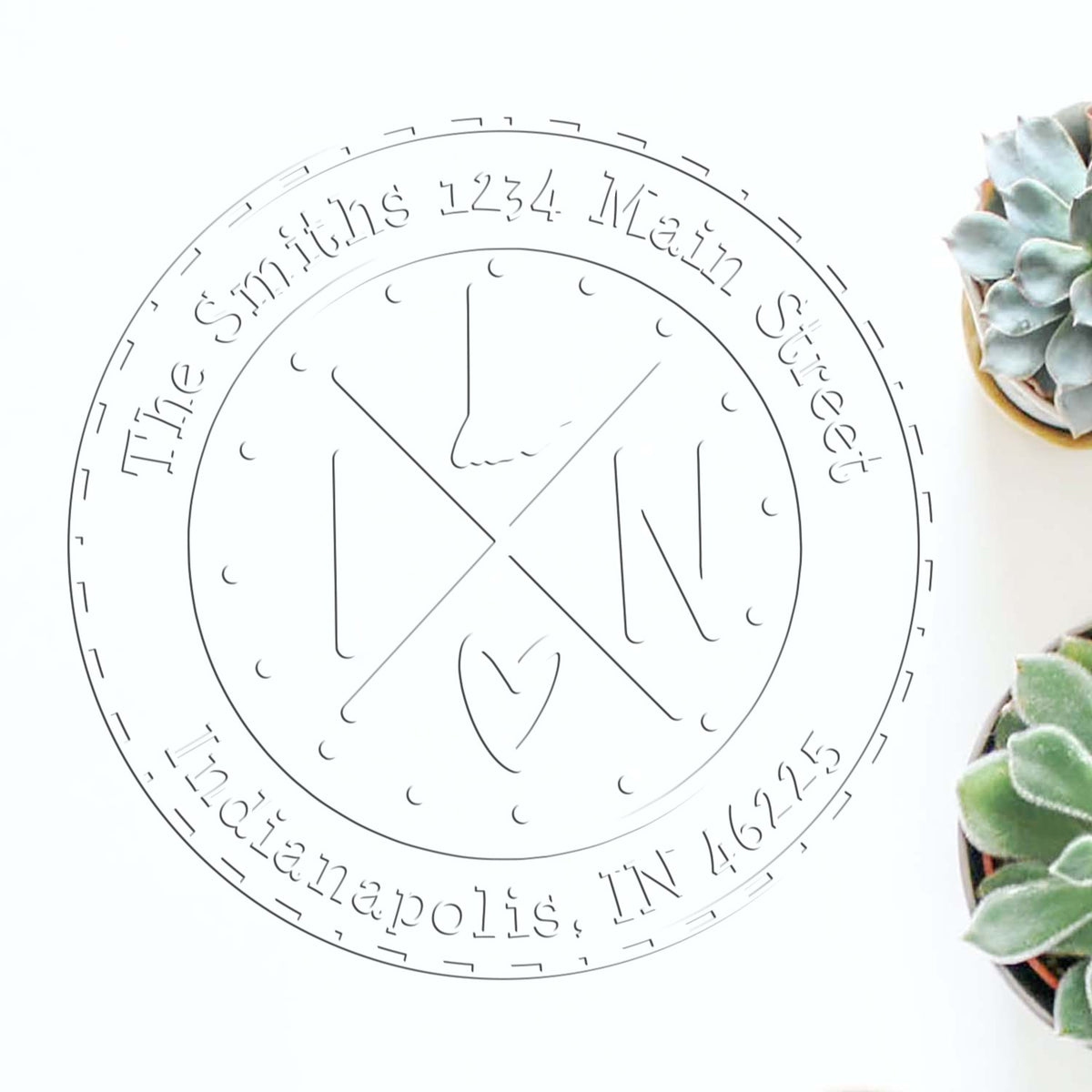 Gray circular custom stamp seal with monogram initials, The Smiths, 1234 Main Street, Indianapolis, IN 46225, on white.