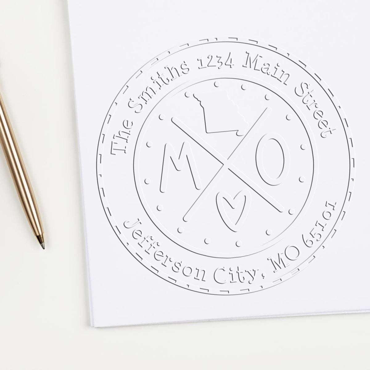 Trodat State Cross Hybrid Missouri address seal in use, featuring customizable design and state love stamp for home address embossing.
