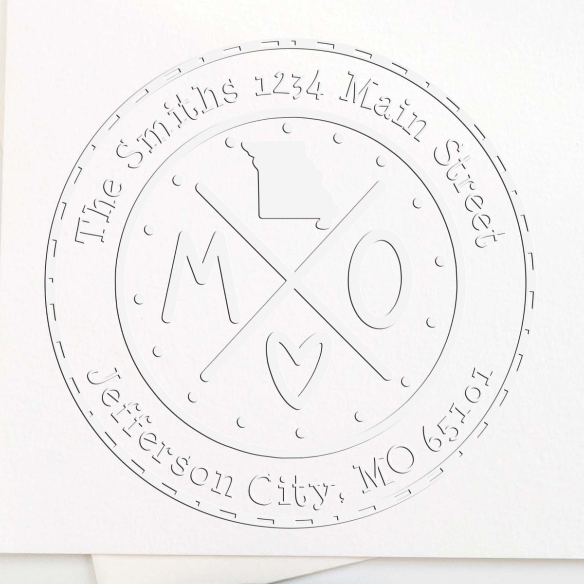 Trodat State Love Stamp featuring Missouri, customizable home address seal in use, with raised state outline and text details.
