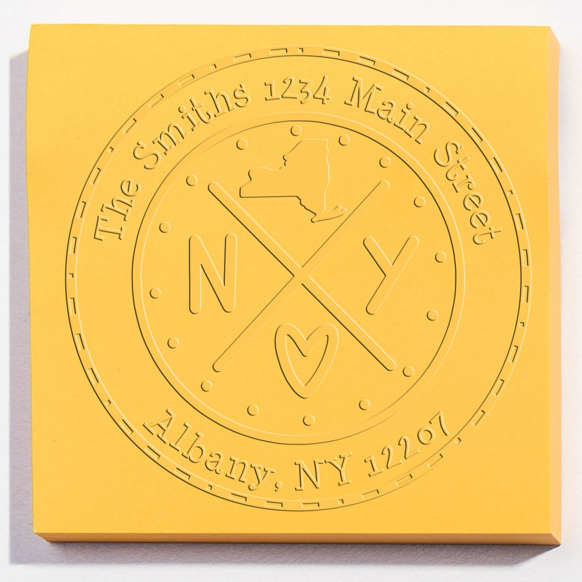 Trodat State Cross Hybrid New York return address embossed seal from State Love Stamps in use, featuring a customizable design.