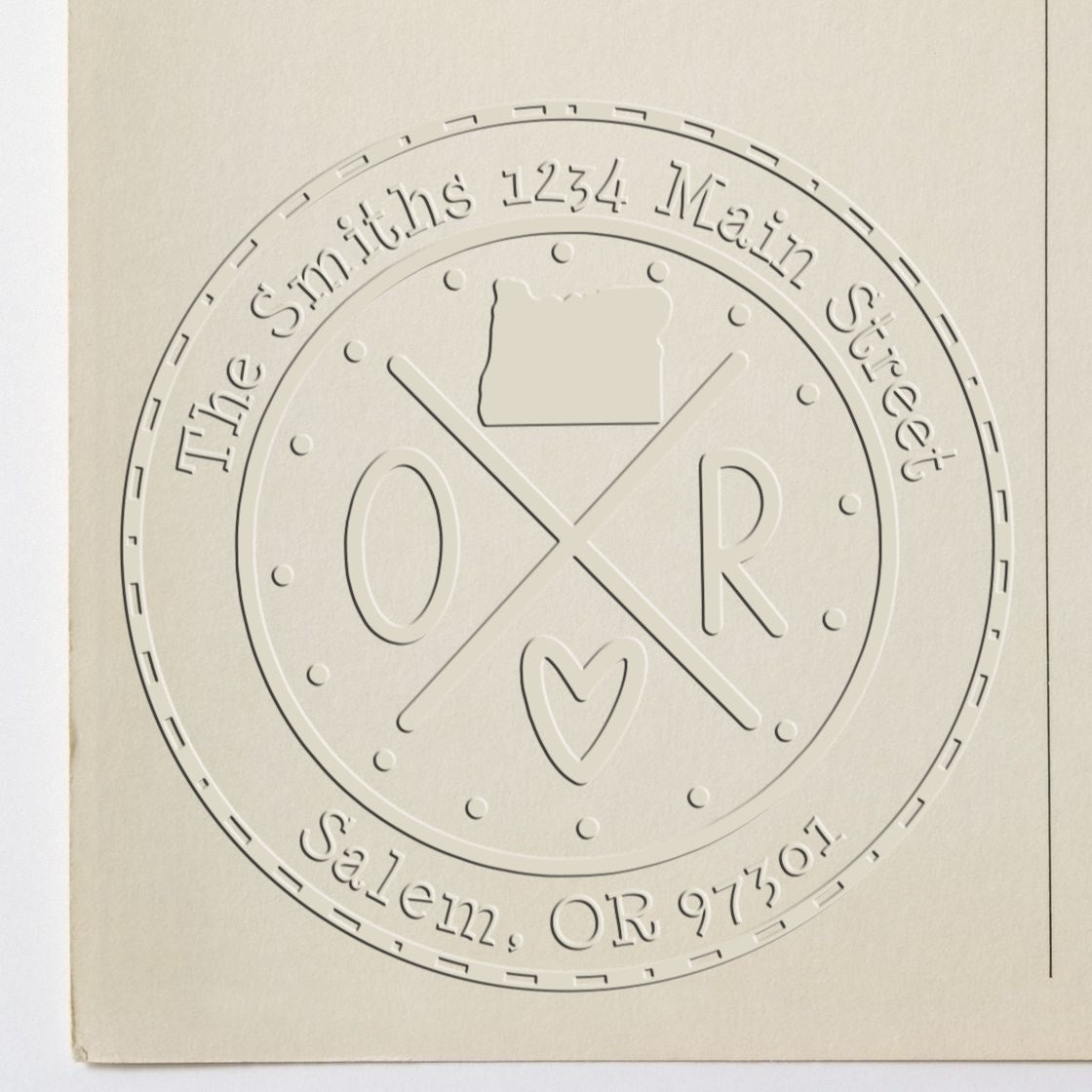 Cream embossed stamp seal for The Smiths, featuring crossed lines, heart icon, and address text around the circle.