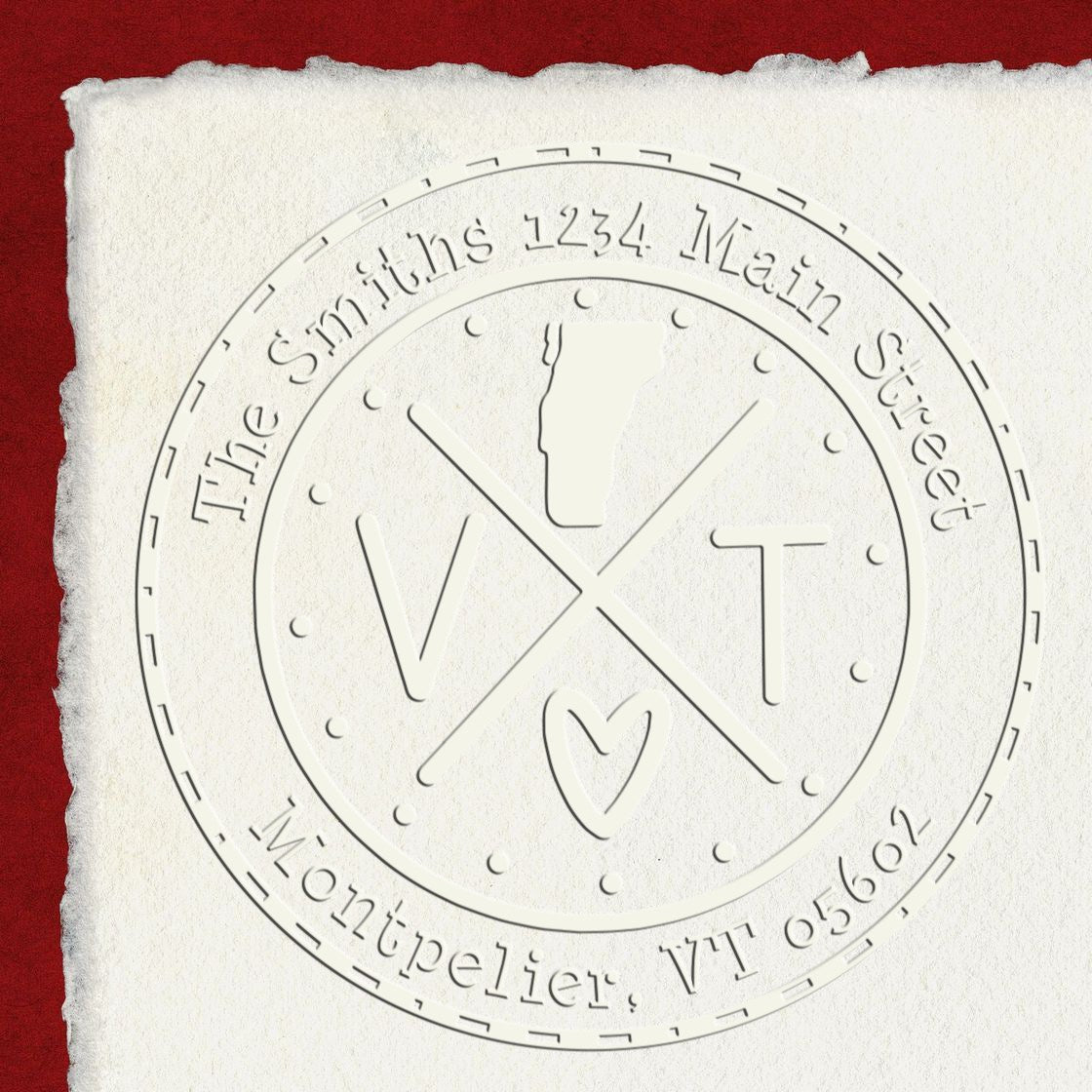 Trodat State Cross Hybrid Vermont address return embossing seal from State Love Stamps, in use with intricate embossed design.