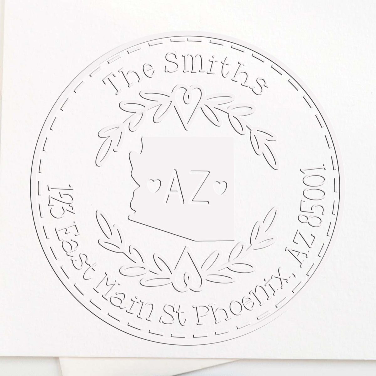 White circular custom stamp seal with The Smiths, Arizona outline, laurel wreath, and address text on a light background.