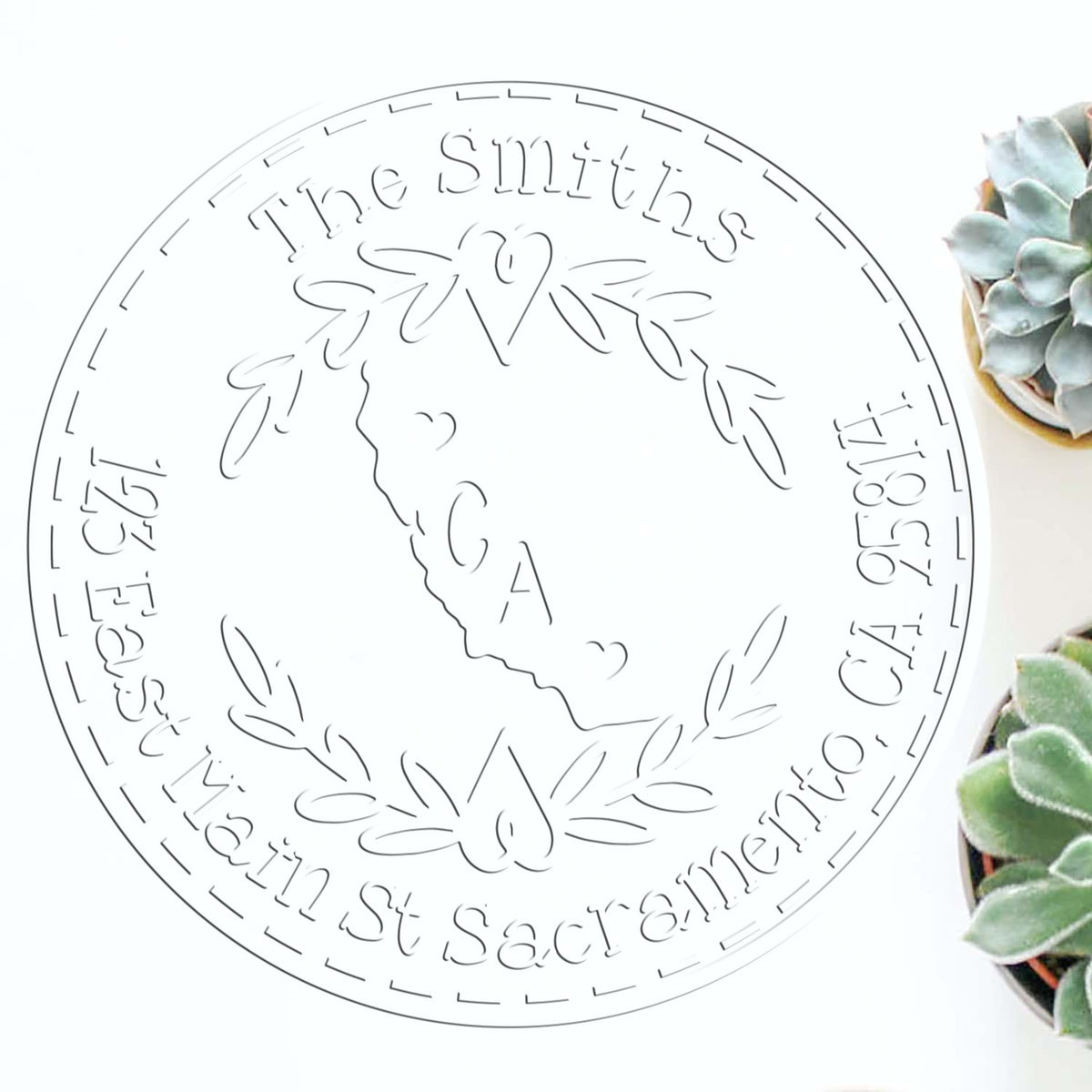 Custom circular rubber stamp seal with black line art, wreath design, and The Smiths text on a white background.