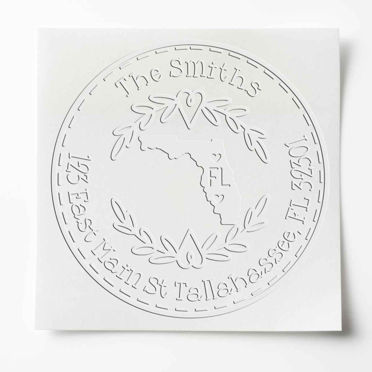 Trodat State Love Stamps Florida custom embossed return address seal with state-shaped design in use.