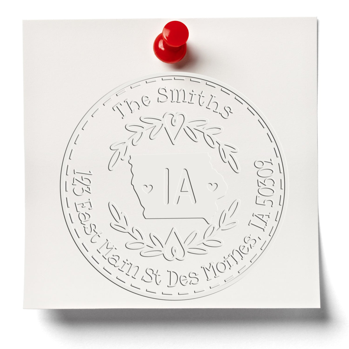Embossed white custom stamp seal for The Smiths, featuring Iowa outline, IA initials, and a red pushpin.