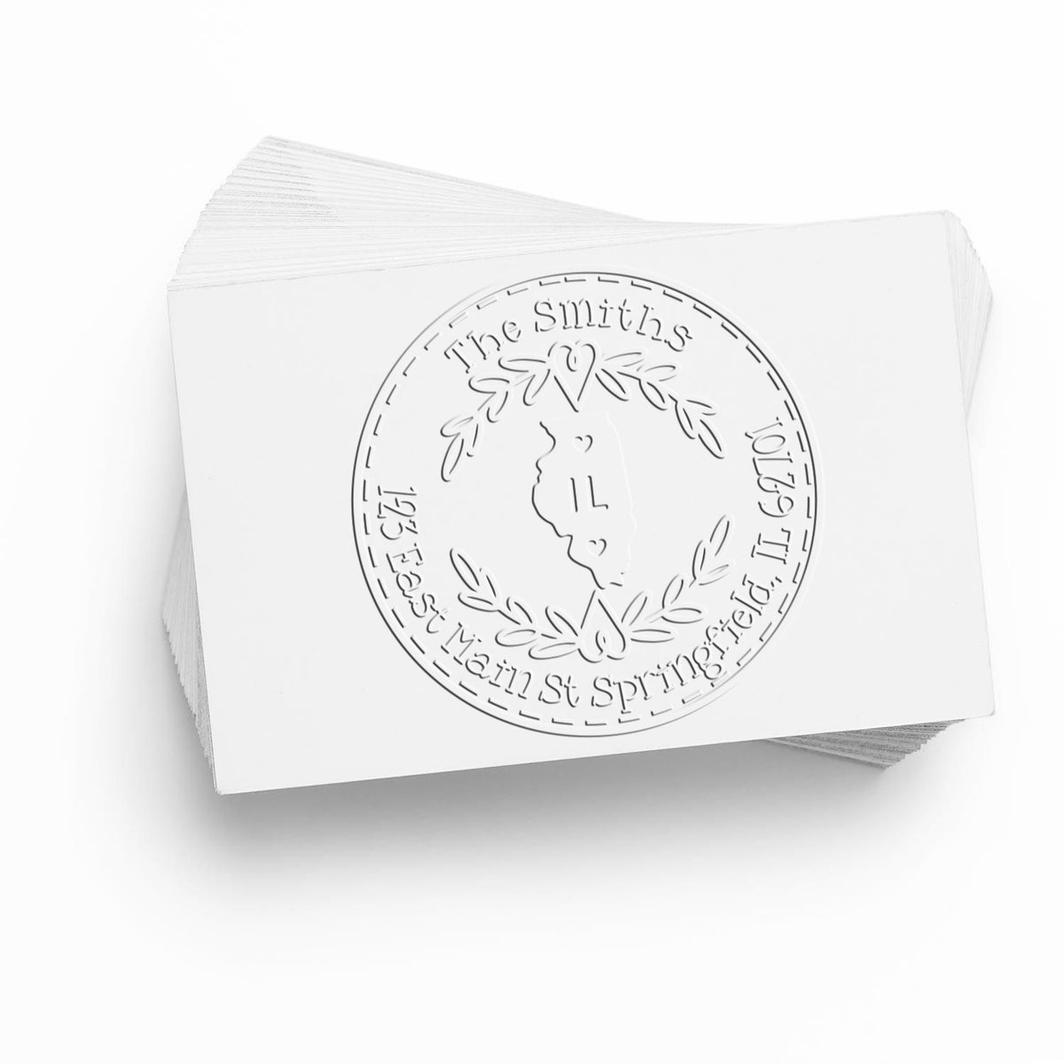 Trodat State Love Stamps IL custom return address embossing seal with intricate state outline and detailed embossing in use.